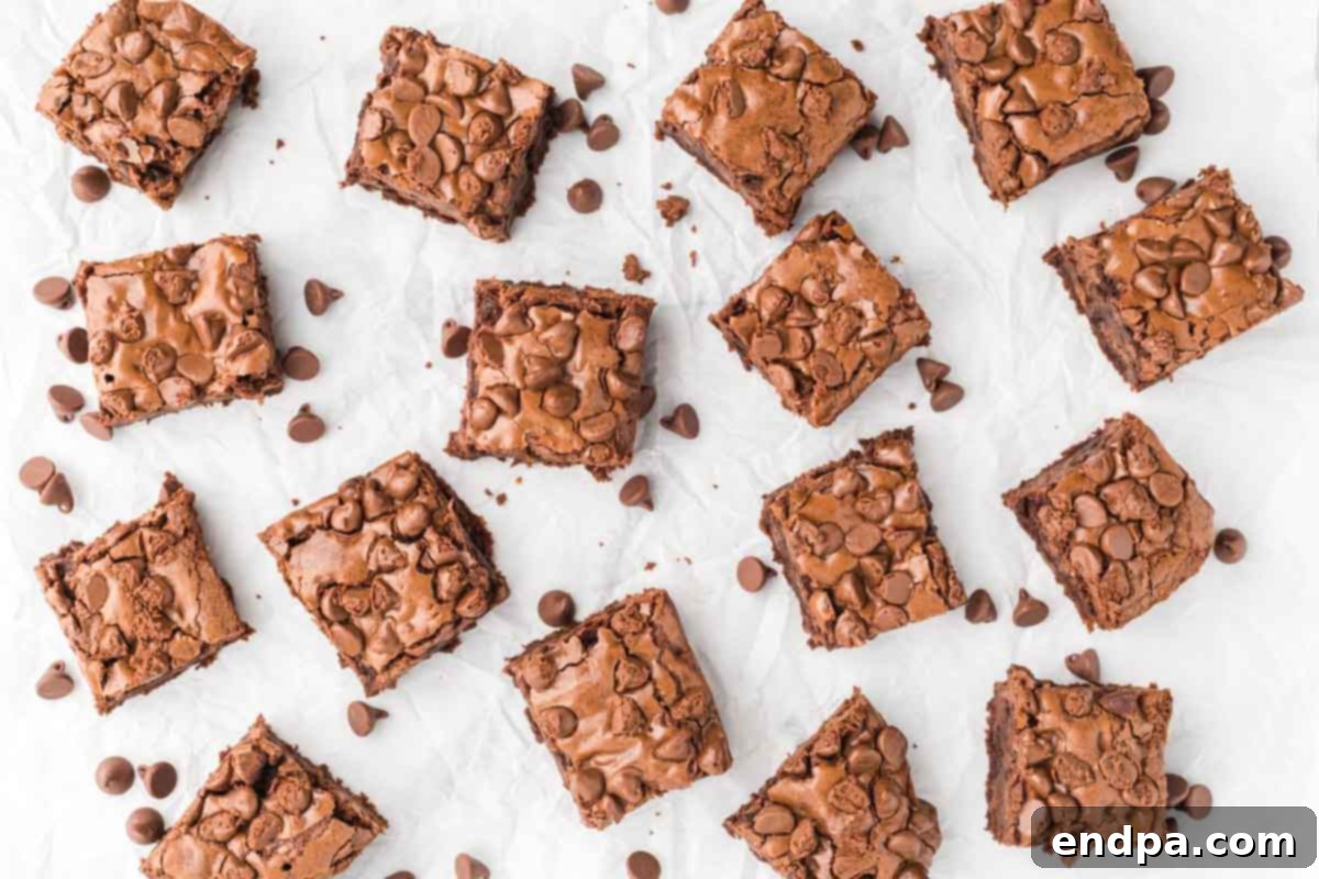 Close-up of baked Starbucks brownies, glistening with melted chocolate.