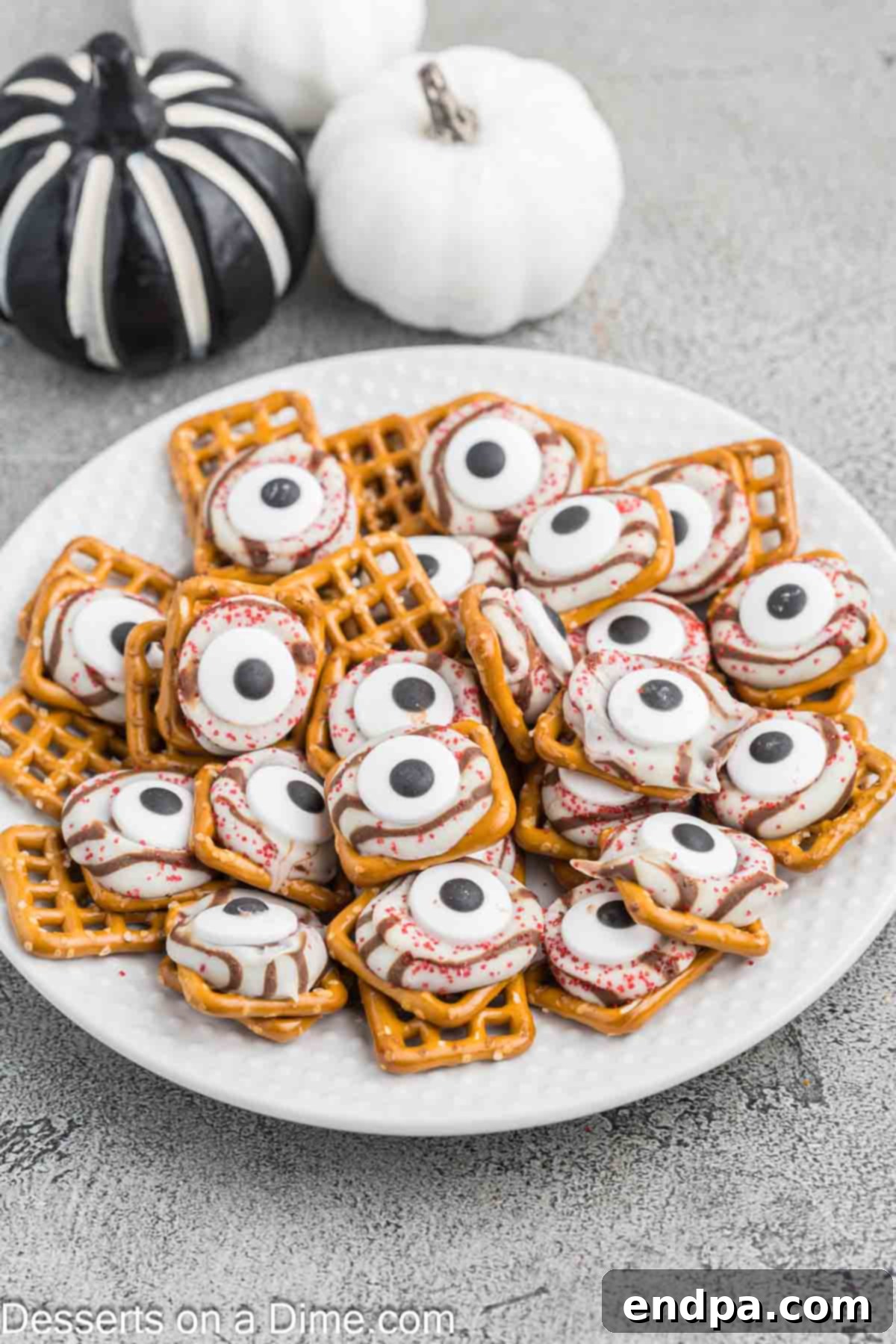 Halloween Monster Eyeball Pretzels arranged on a platter, ready for a spooky celebration.