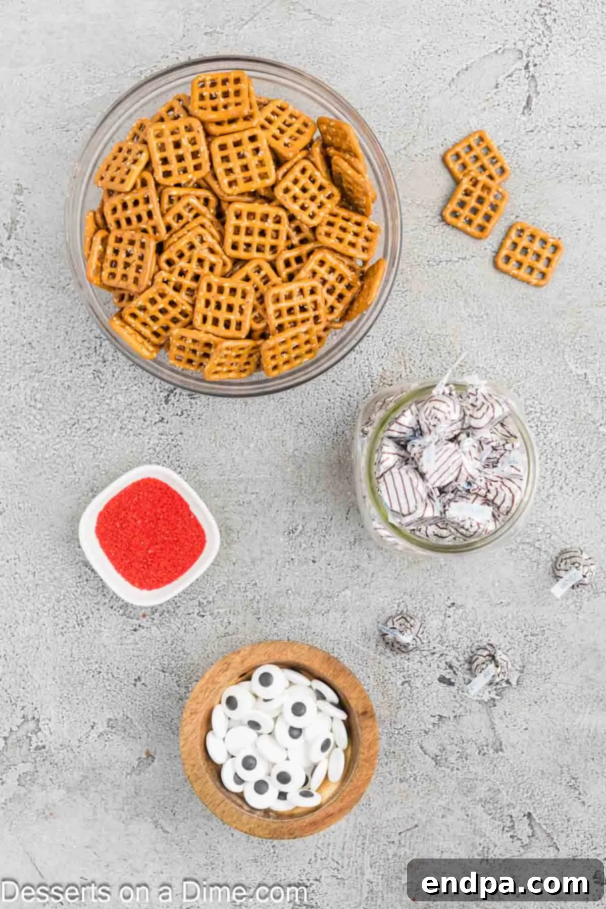 Essential ingredients for Halloween Monster Eyeball Pretzels laid out.