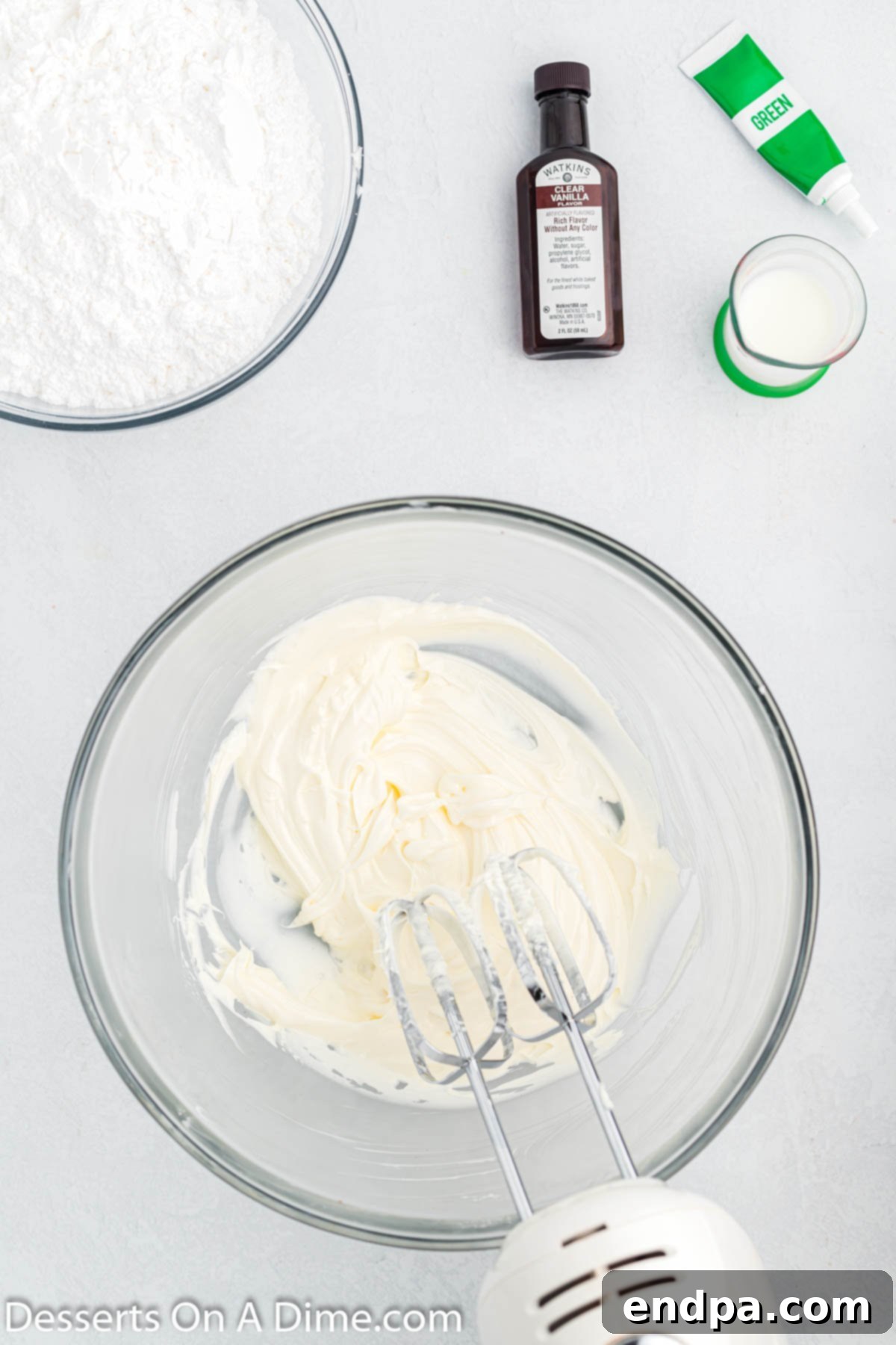A large mixing bowl containing softened shortening and butter, ready to be creamed together for the frosting.