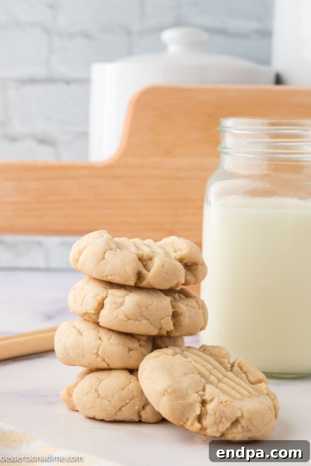 Custard cookies stacked together, showcasing their soft, inviting texture.