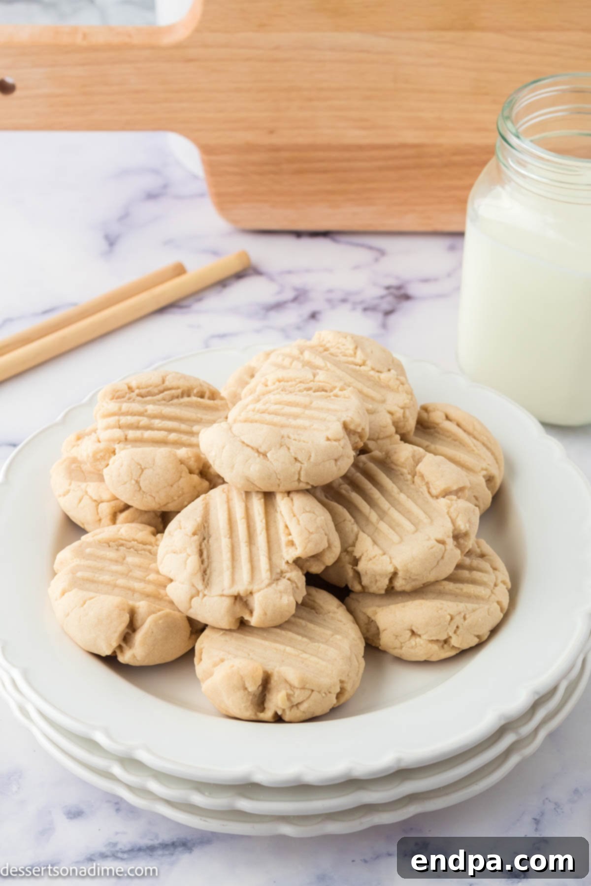 Plate of golden-brown custard cookies, ready to eat.