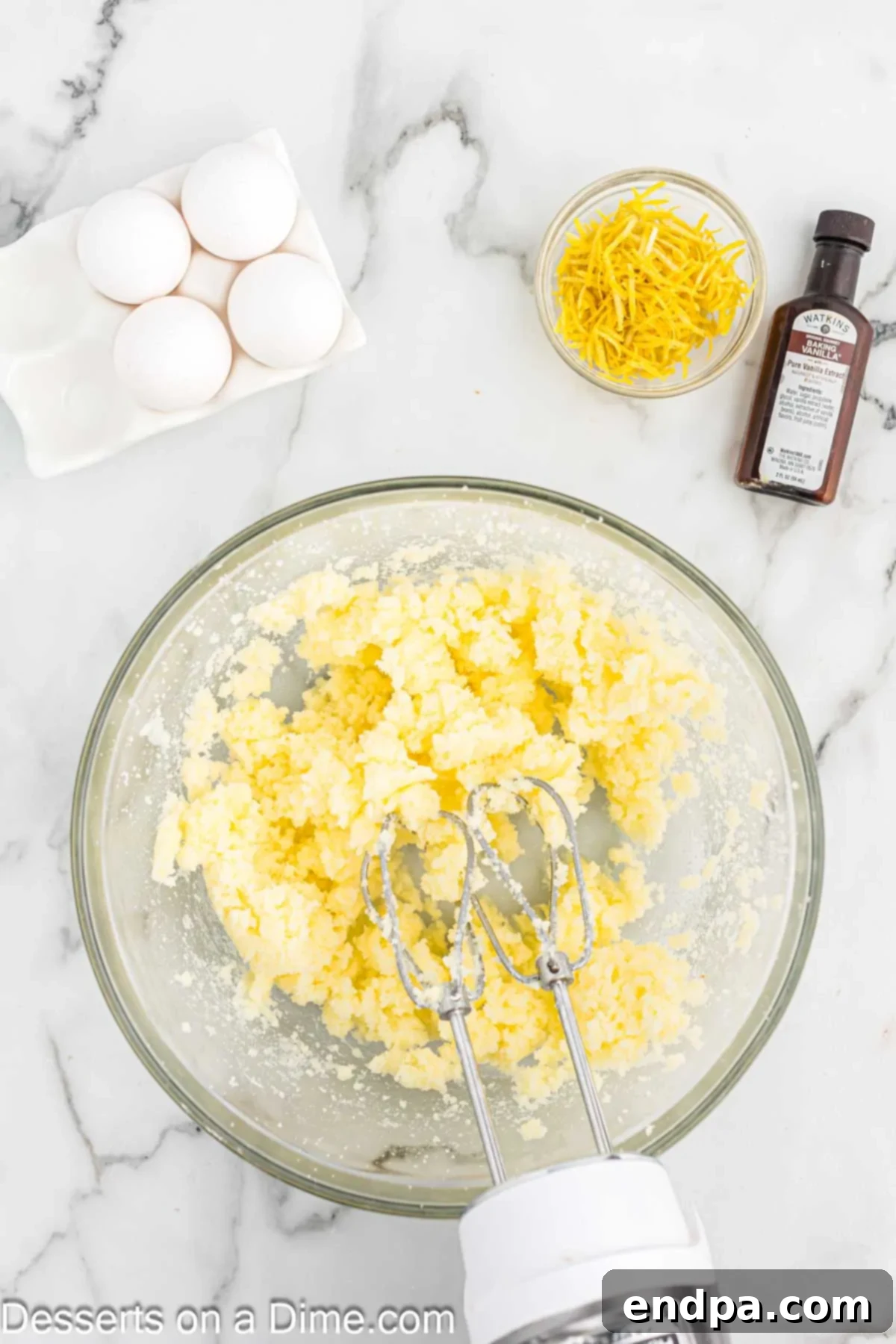 Bowl with butter and sugar creamed together for the cupcake batter.