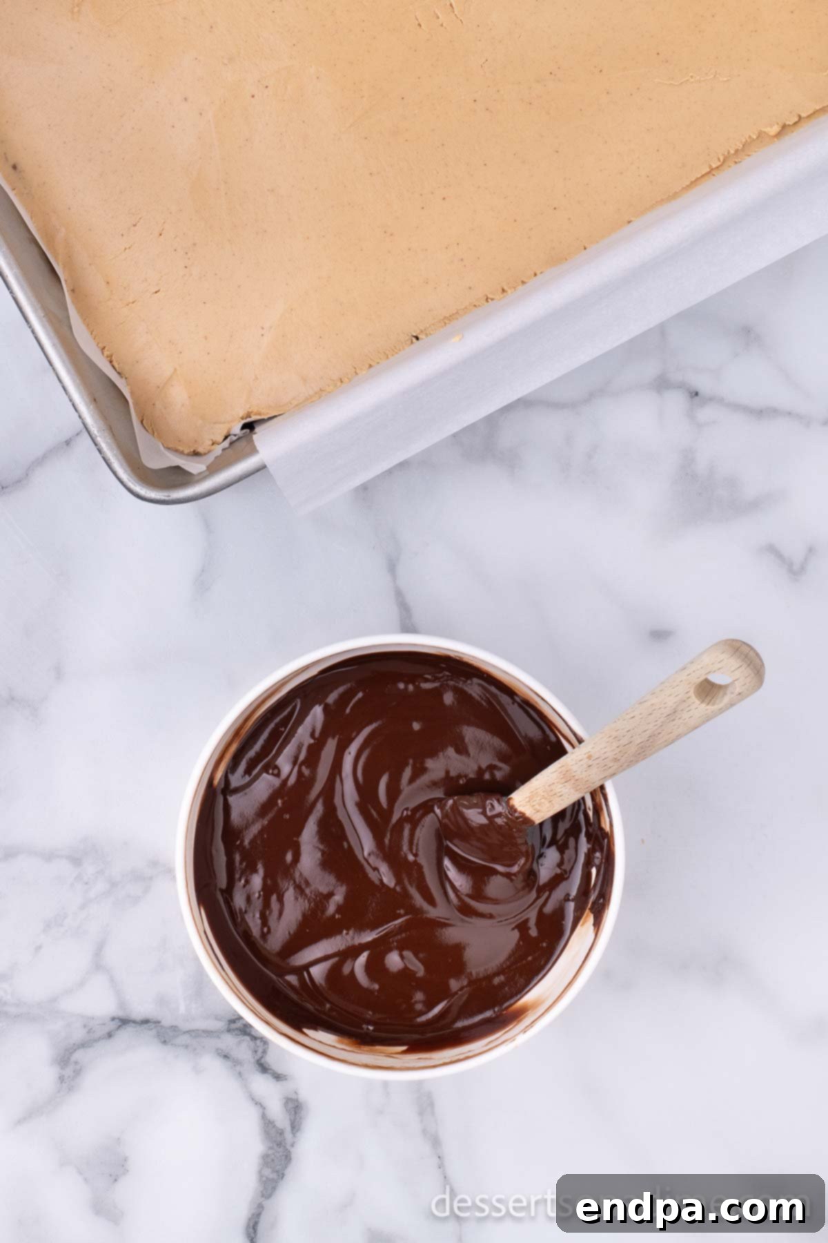 Decadent Chocolate Peanut Butter Buckeye Brownies 11 Chocolate melted in bowl.