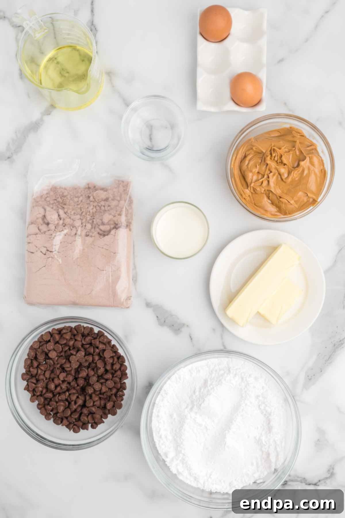 Decadent Chocolate Peanut Butter Buckeye Brownies 3 Ingredients for buckeye brownies- oil, eggs, peanut butter, brownie mix, chocolate chips, butter, powdered sugar.