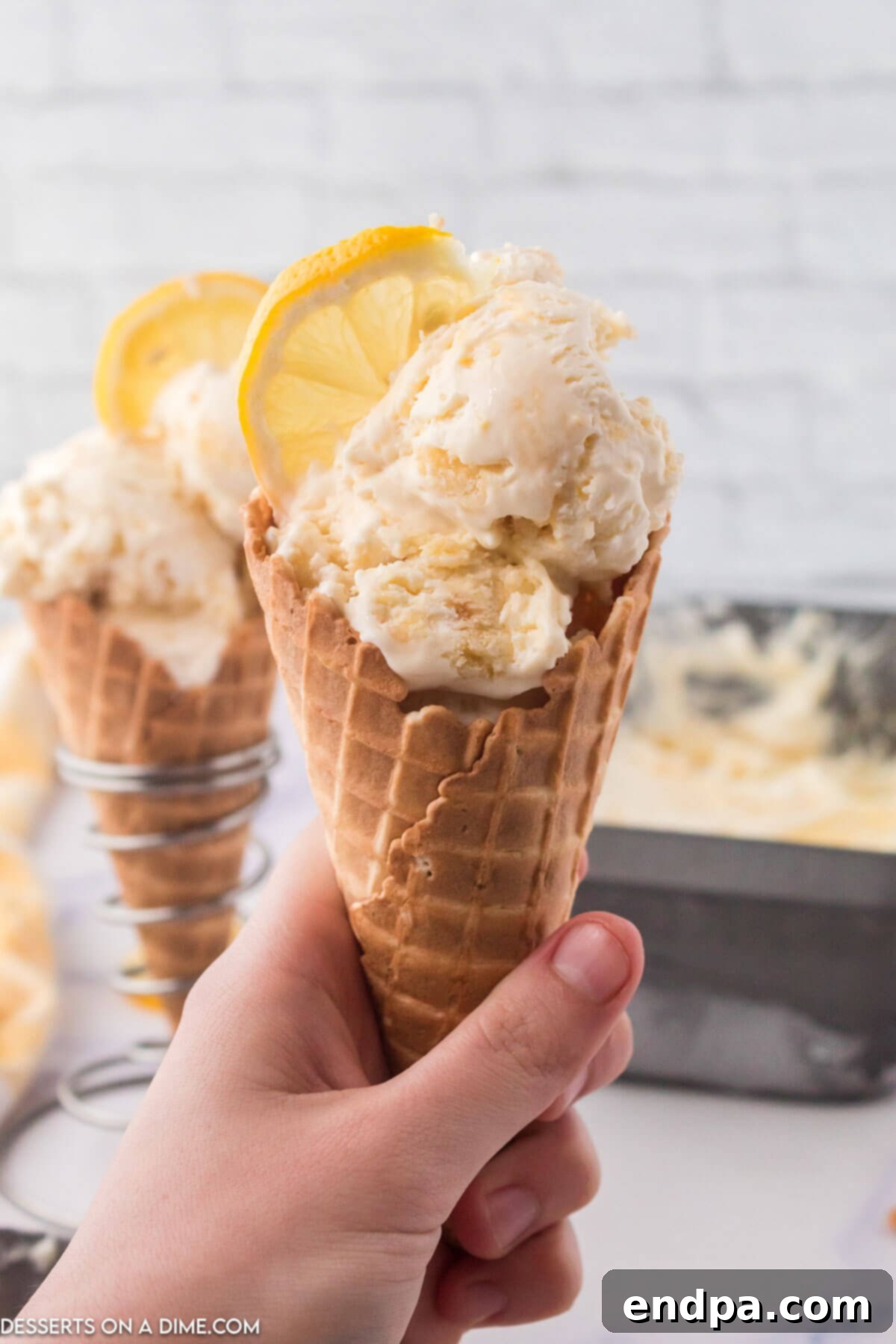 Zesty Shortbread Crumble Ice Cream 7 Scoop of lemon shortbread ice cream in a waffle cone.