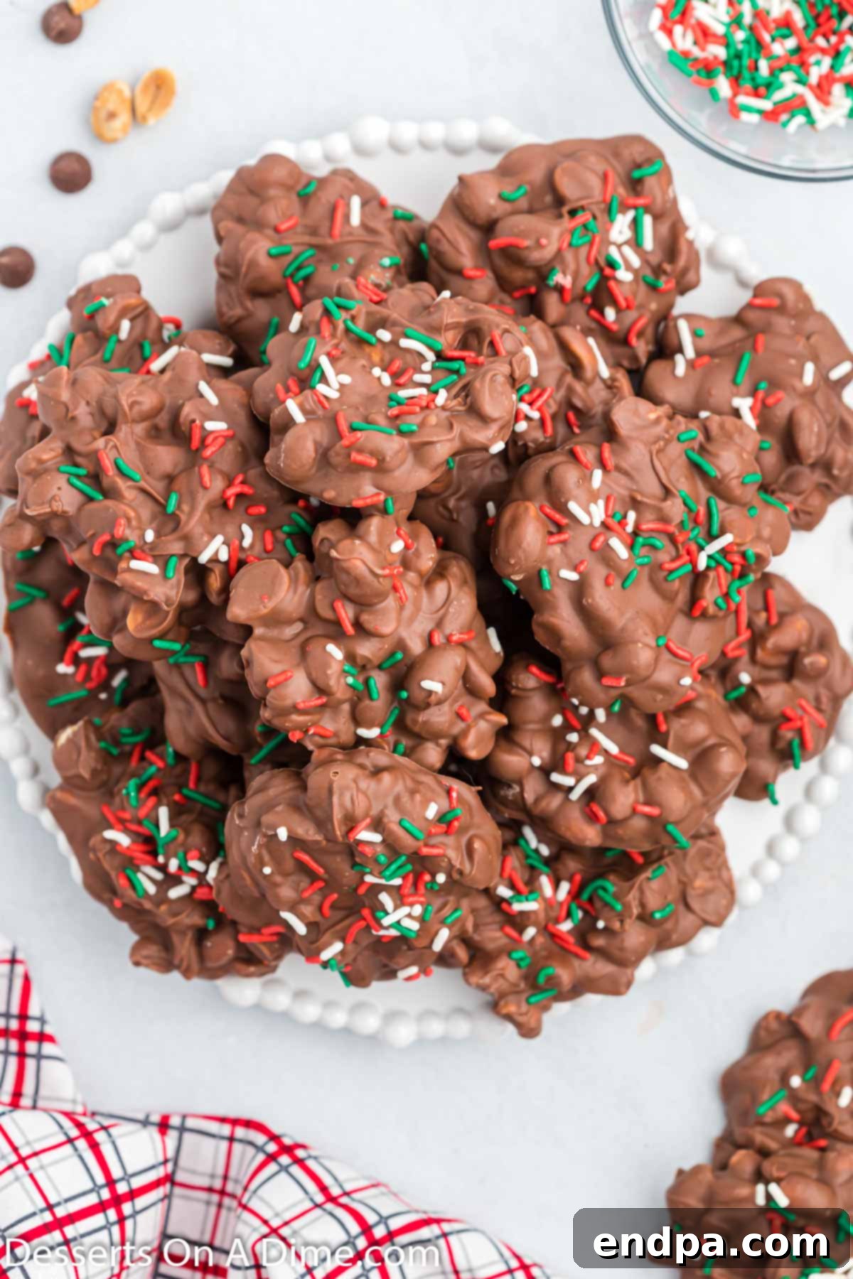Crock pot christmas candy on a platter, ready to be served.