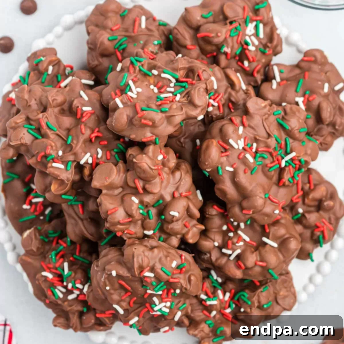 Crock pot Christmas crack candy on a platter.