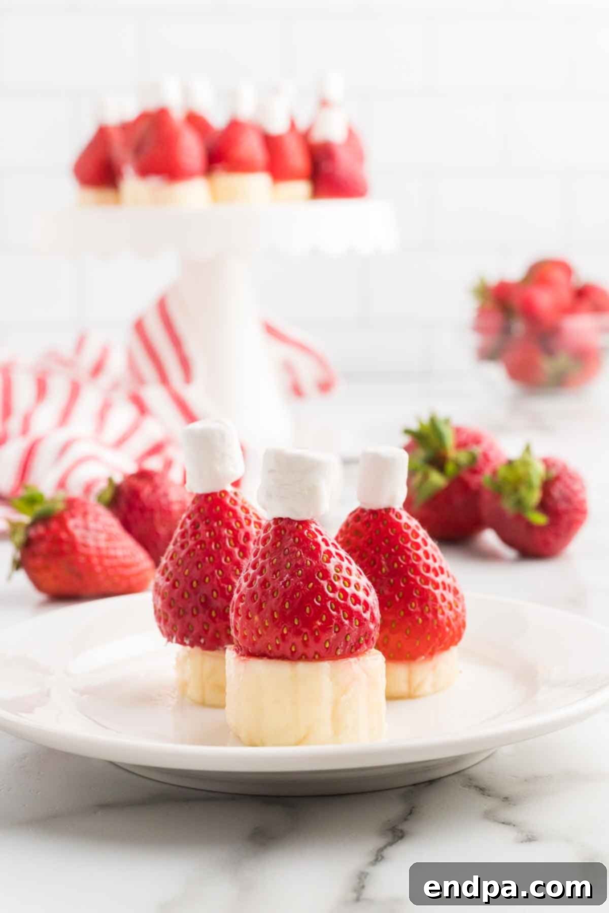 Santa hats on a plate, ready to be enjoyed as a festive no-bake dessert.
