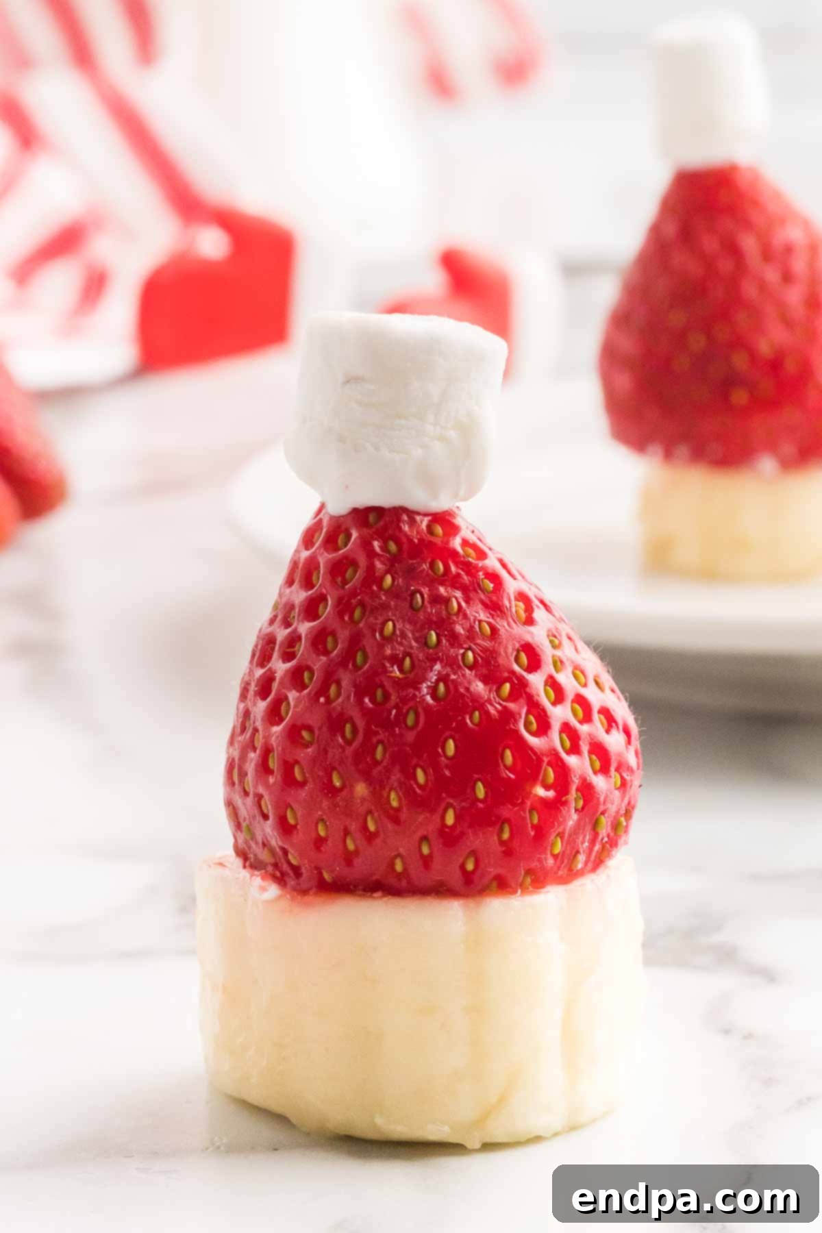 Close-up of a finished Strawberry Santa Hat, ready to eat.