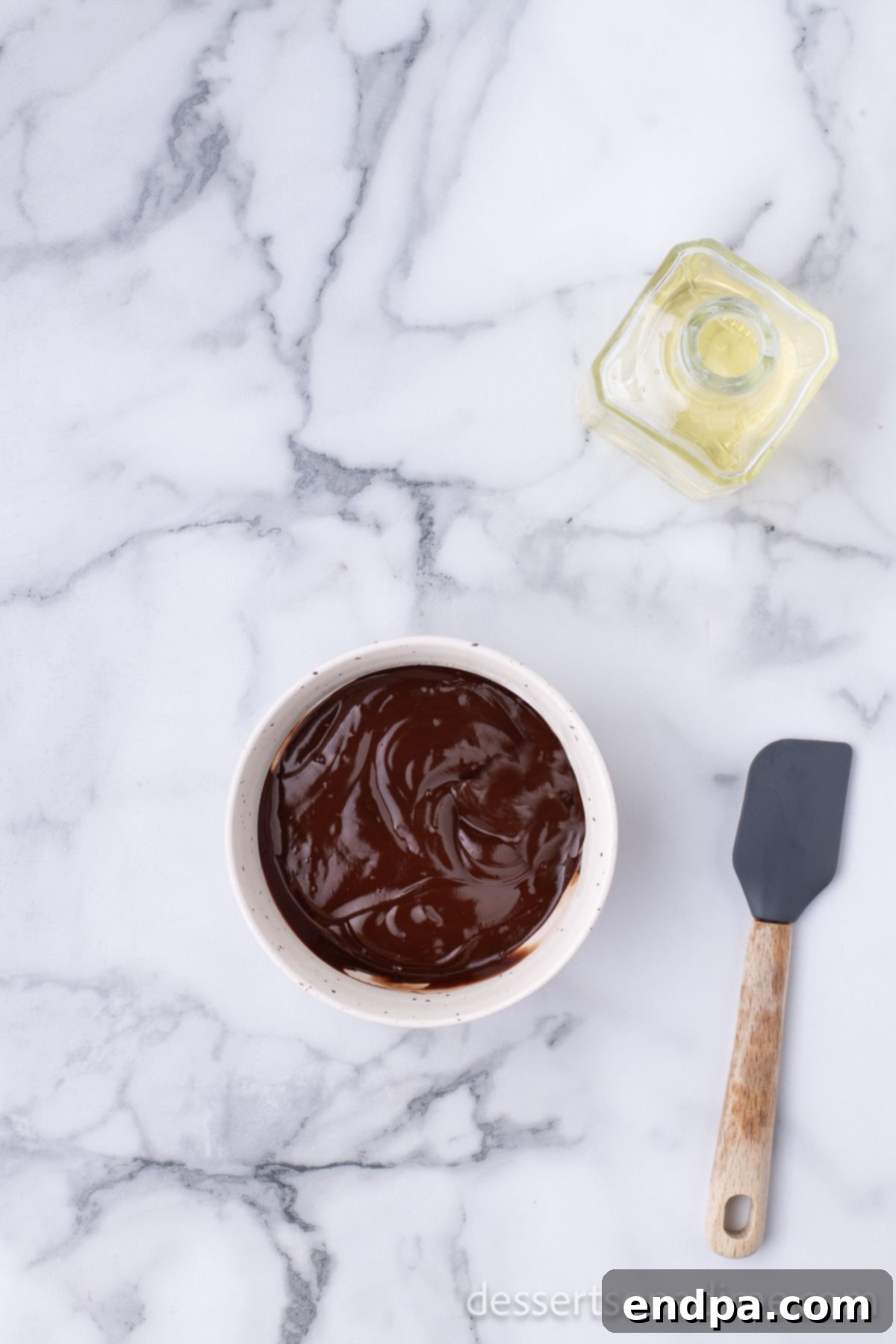 Peanut Butter Brownie Bliss Bites 8 Bowl with semi-sweet chocolate chips and oil, melted into a smooth glaze.