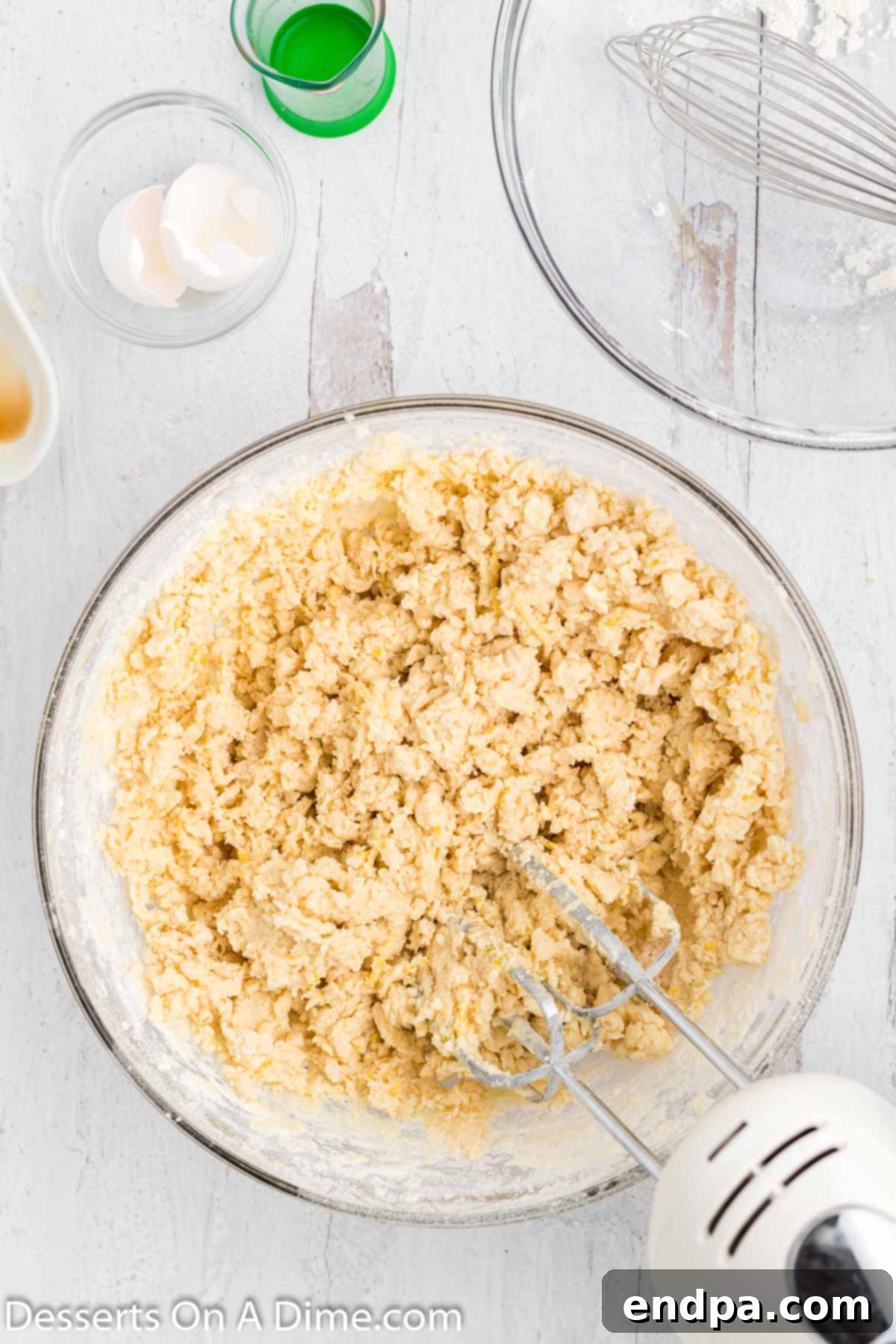 The fully combined cookie dough in a mixing bowl, ready for rolling.