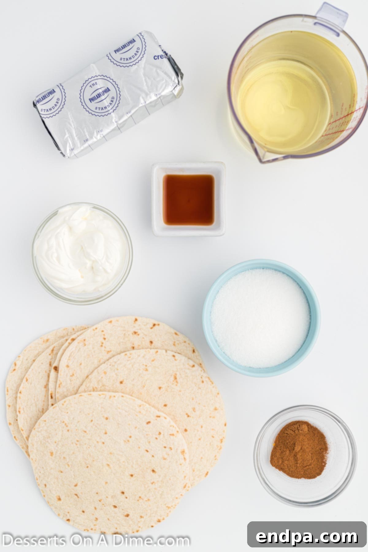 Crispy Cheesecake Chimis 3 Ingredients for Cheesecake chimichangas: cream cheese, granulated sugar, vanilla extract, sour cream, small flour tortillas, vegetable oil, and cinnamon.