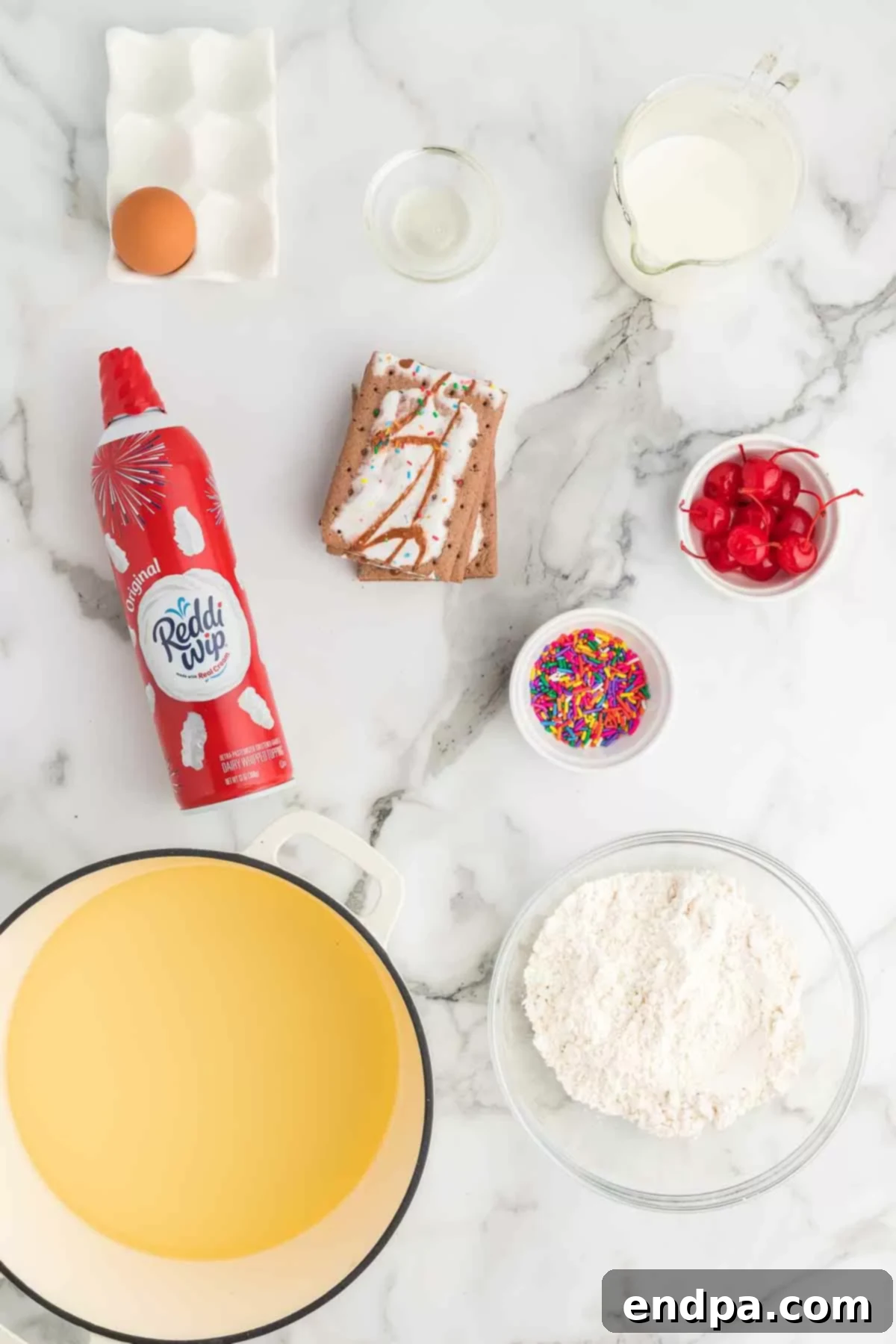 Crispy Sweet Pop Tart Delight 3 Ingredients for Deep fried pop tarts- pop tarts, oil, sprinkles, cherries, pancake mix, whipped cream.