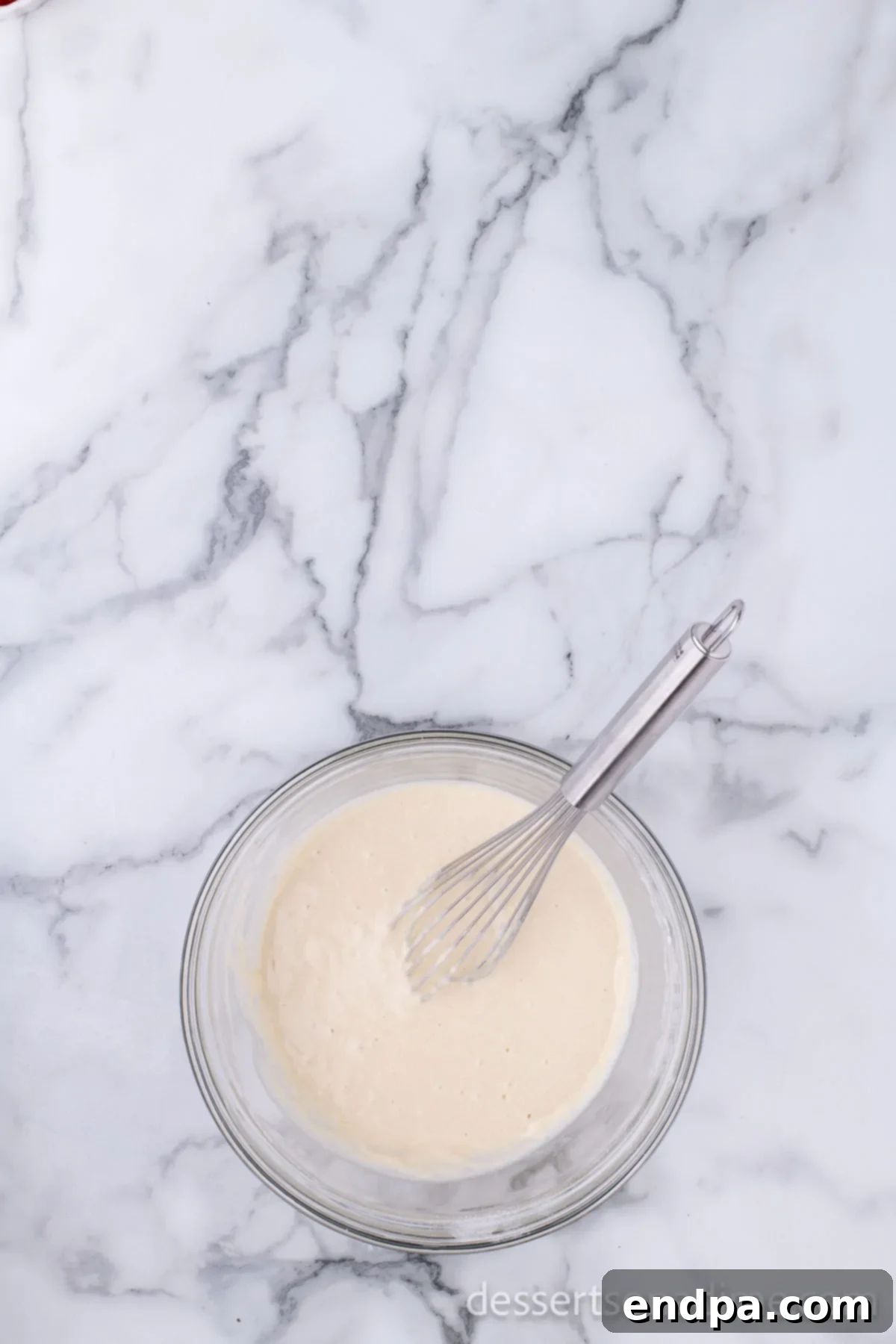 Crispy Sweet Pop Tart Delight 6 Mixing bowl with milk and eggs added to batter.