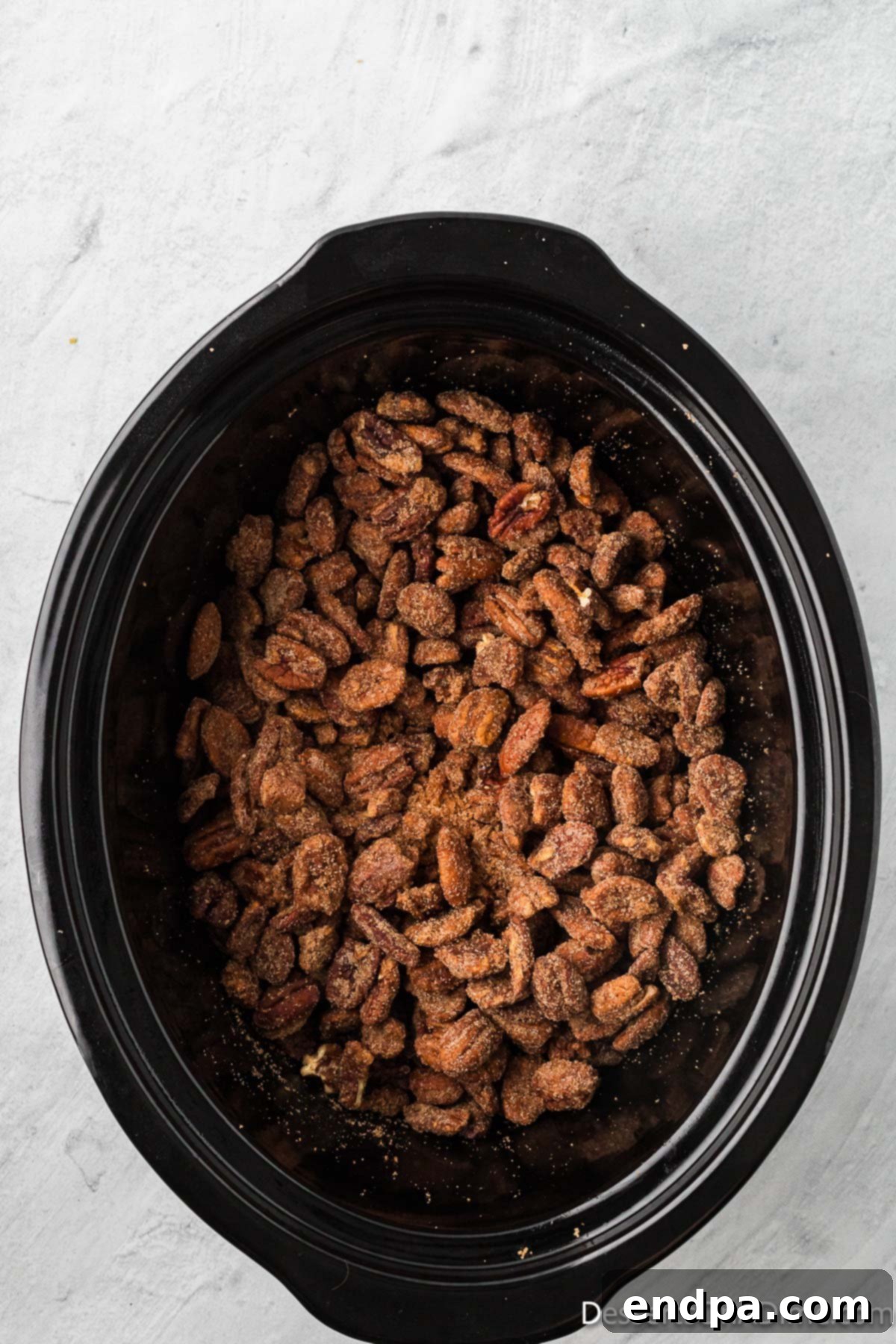Pecan mixture in crock pot. 