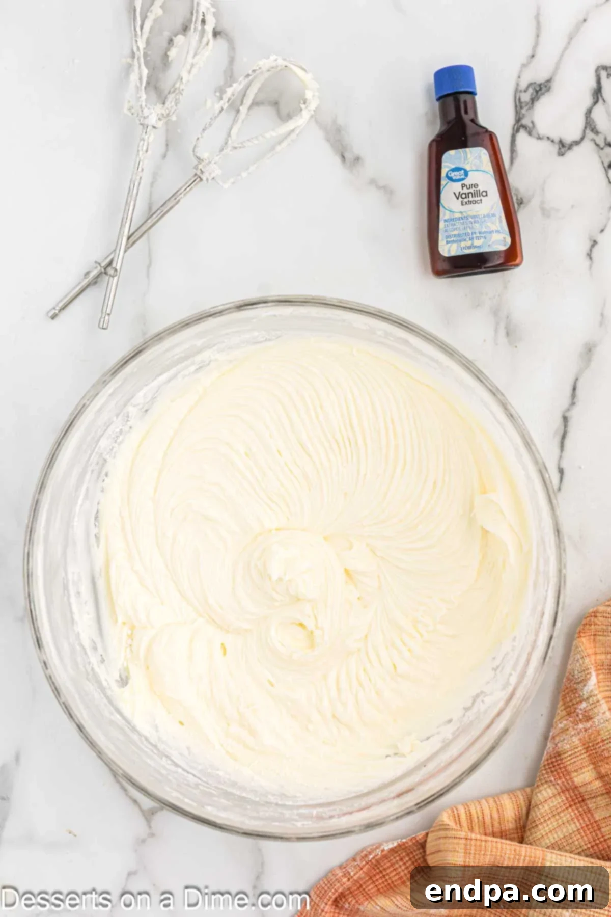 Ultimate Homemade Cream Cheese Frosting 5 Frosting mixture combined until smooth in mixing bowl.