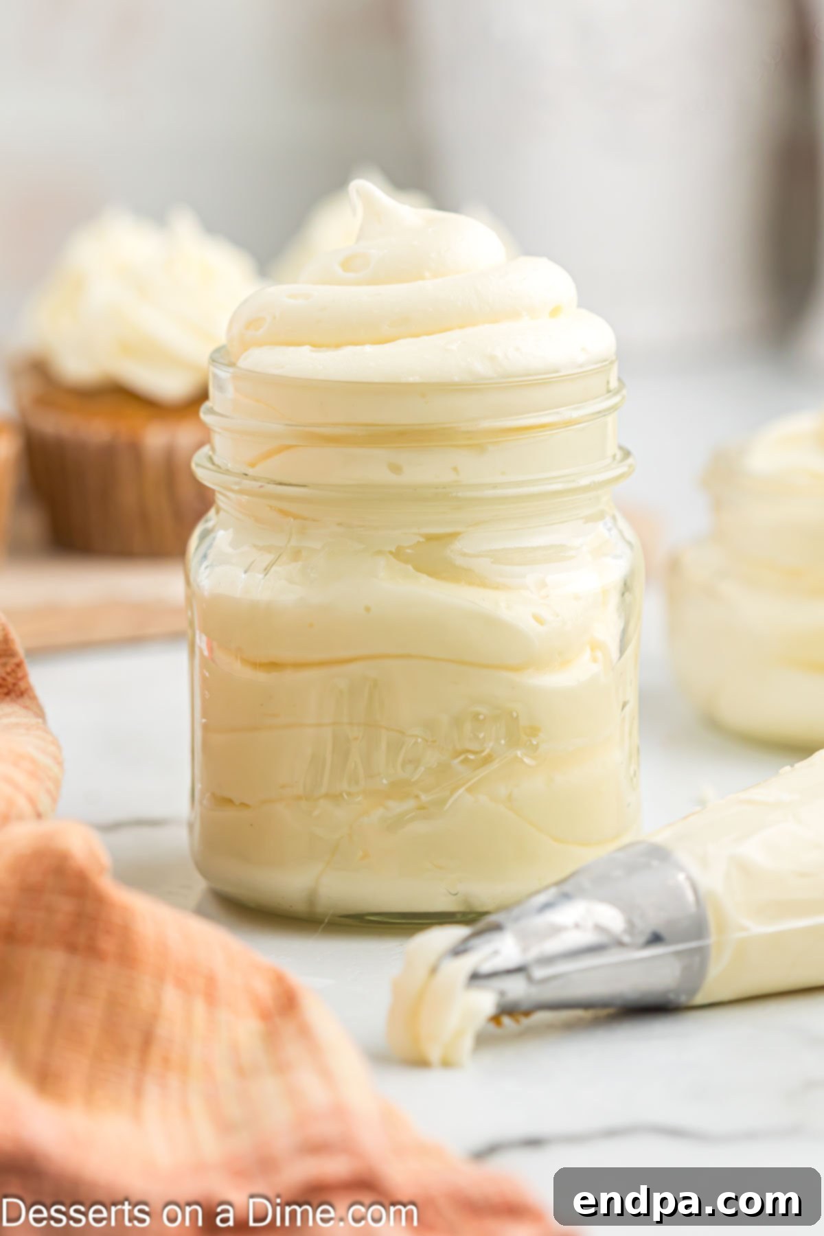 Ultimate Homemade Cream Cheese Frosting 6 Cream Cheese Frosting in a clear jar