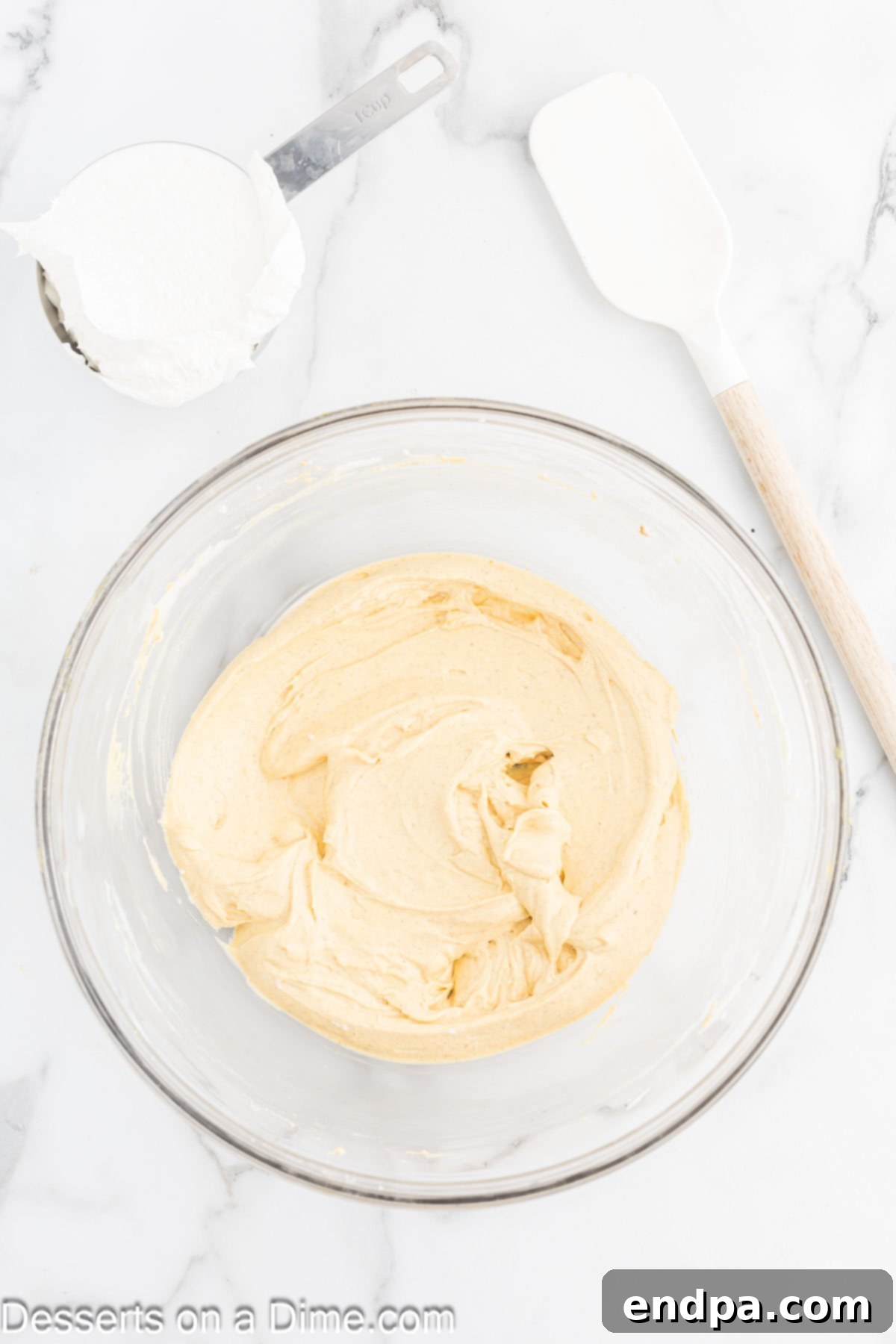 Spiced Pumpkin Cloud Bars 7 Cream cheese beat until fluffy and pumpkin puree mixed in.