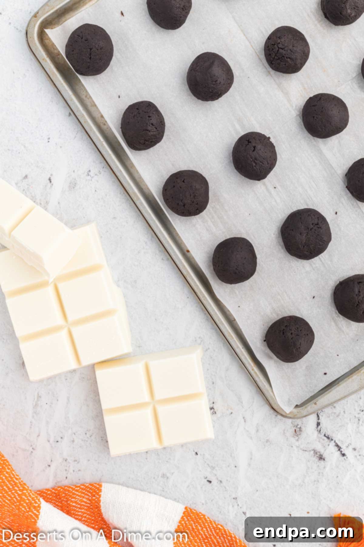 Frosty Oreo Delights 6 Balls on a baking sheet.