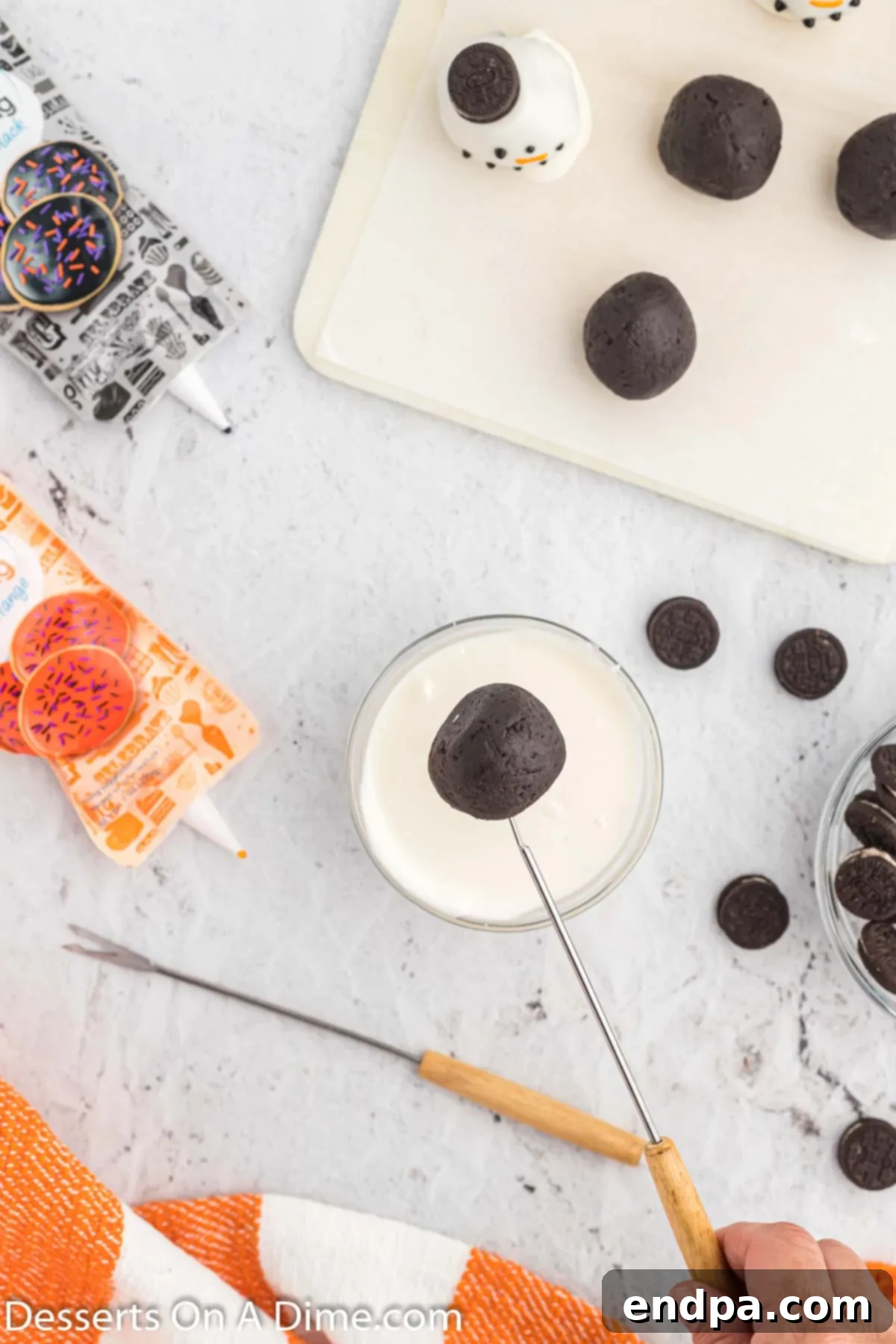 Frosty Oreo Delights 7 Oreo Ball getting ready to be dipped.