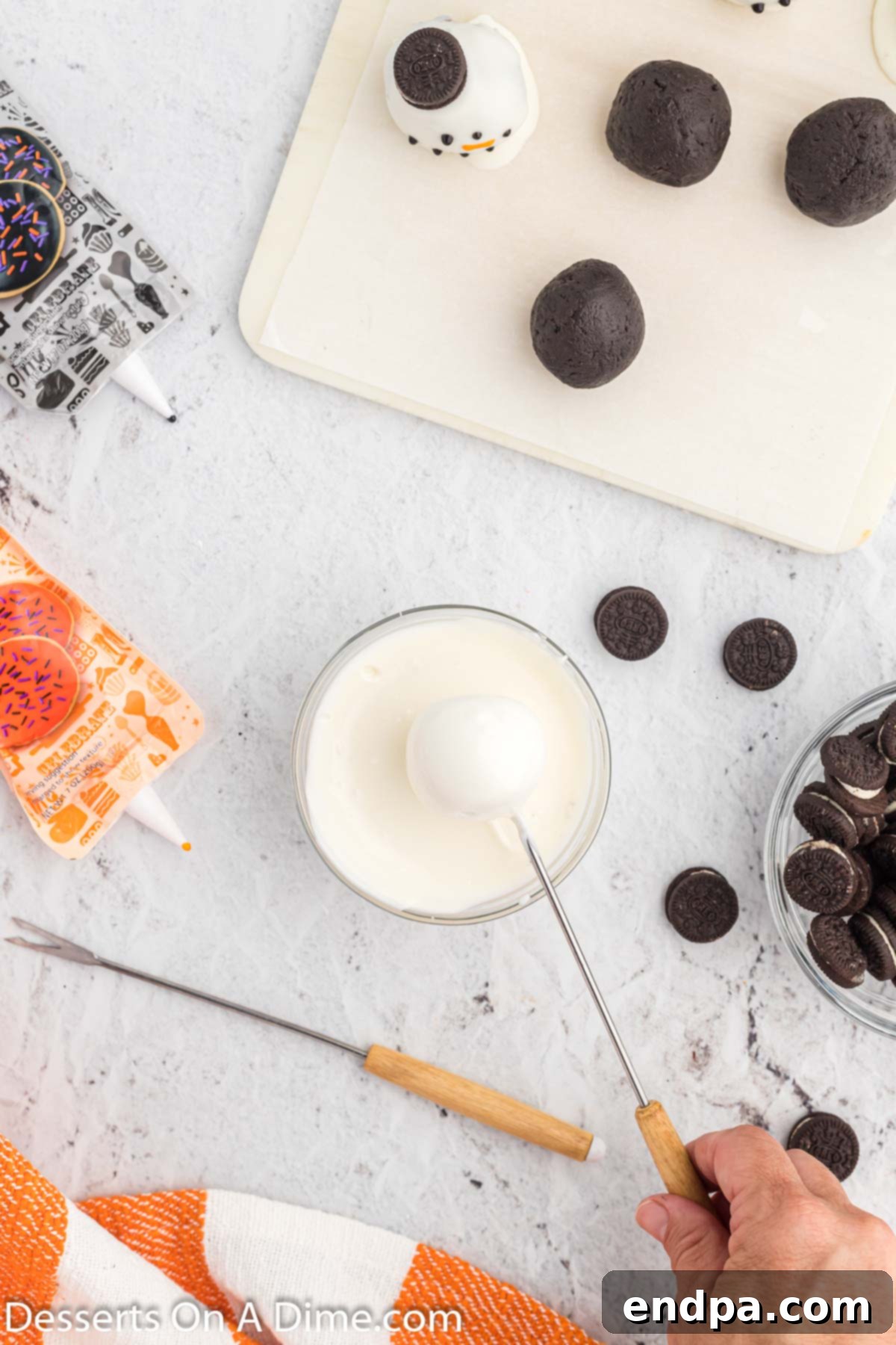 Frosty Oreo Delights 8 Oreo Ball dipped in chocolate.