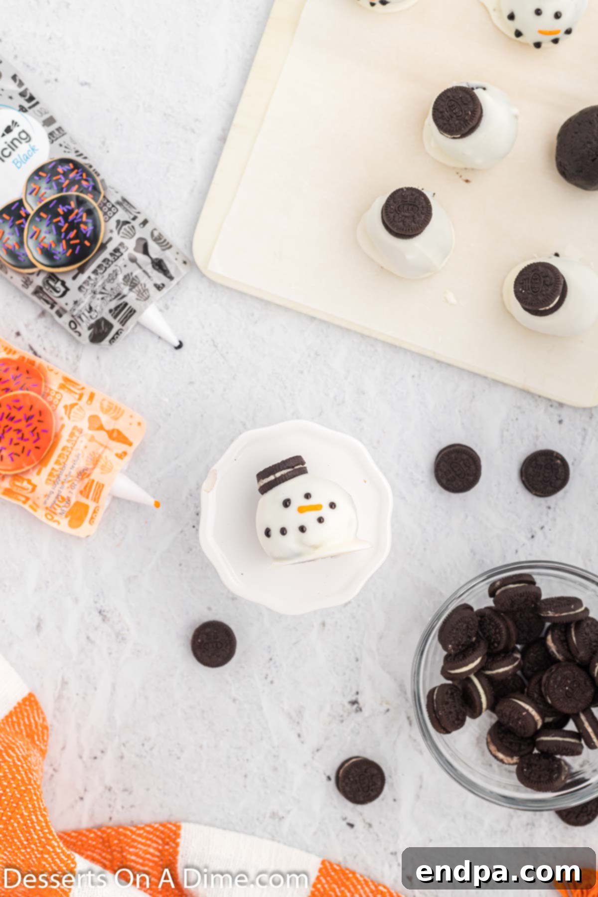 Frosty Oreo Delights 9 Face being decorated on oreo ball.