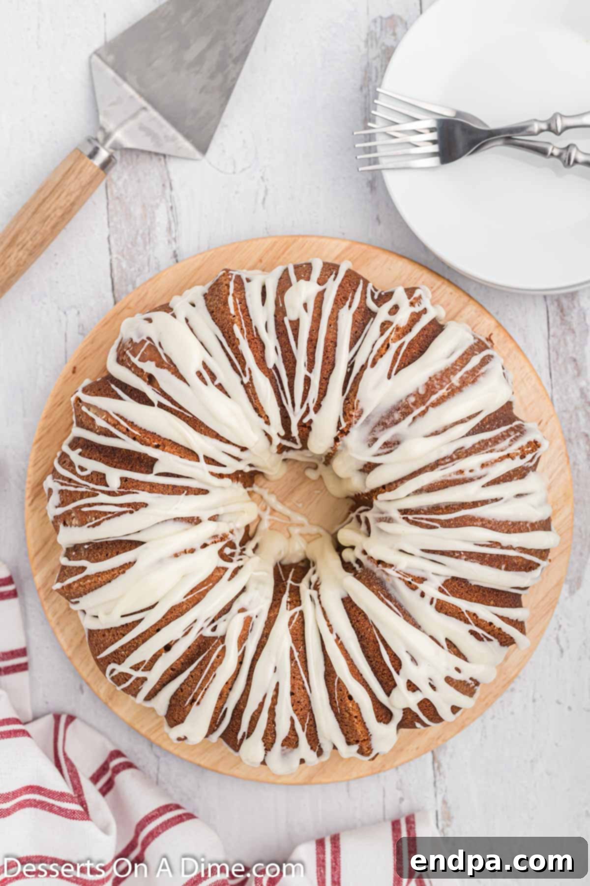 A stunning Red Velvet Pound Cake, sliced and ready to be served, revealing its moist crumb and decadent glaze.