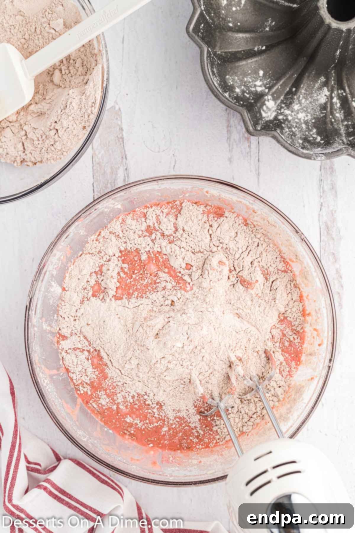 The combined wet and dry ingredients forming the Red Velvet Pound Cake batter.