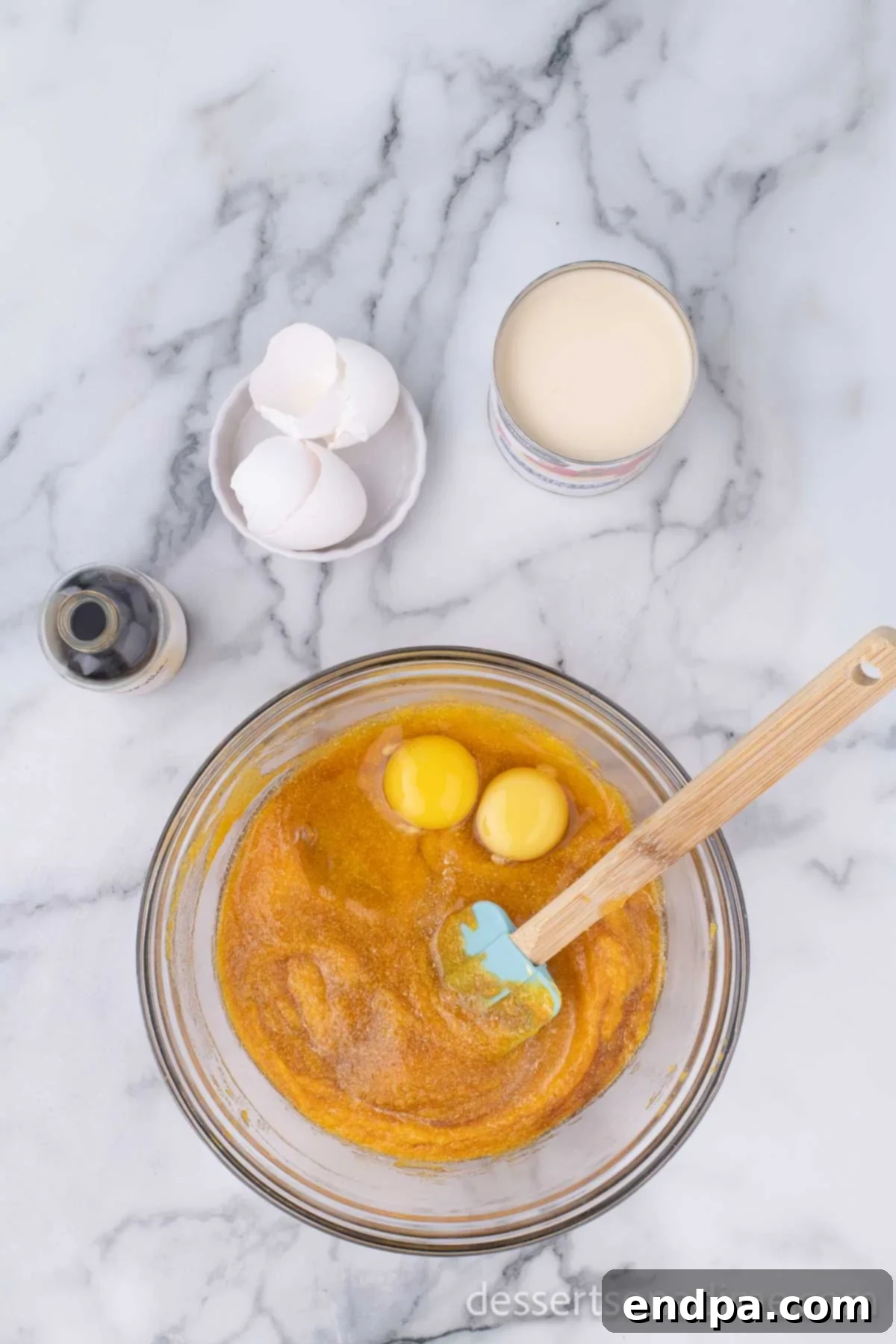 Golden Harvest Butternut Squash Pie 12 Eggs, evaporated milk, and vanilla extract added to mixture.