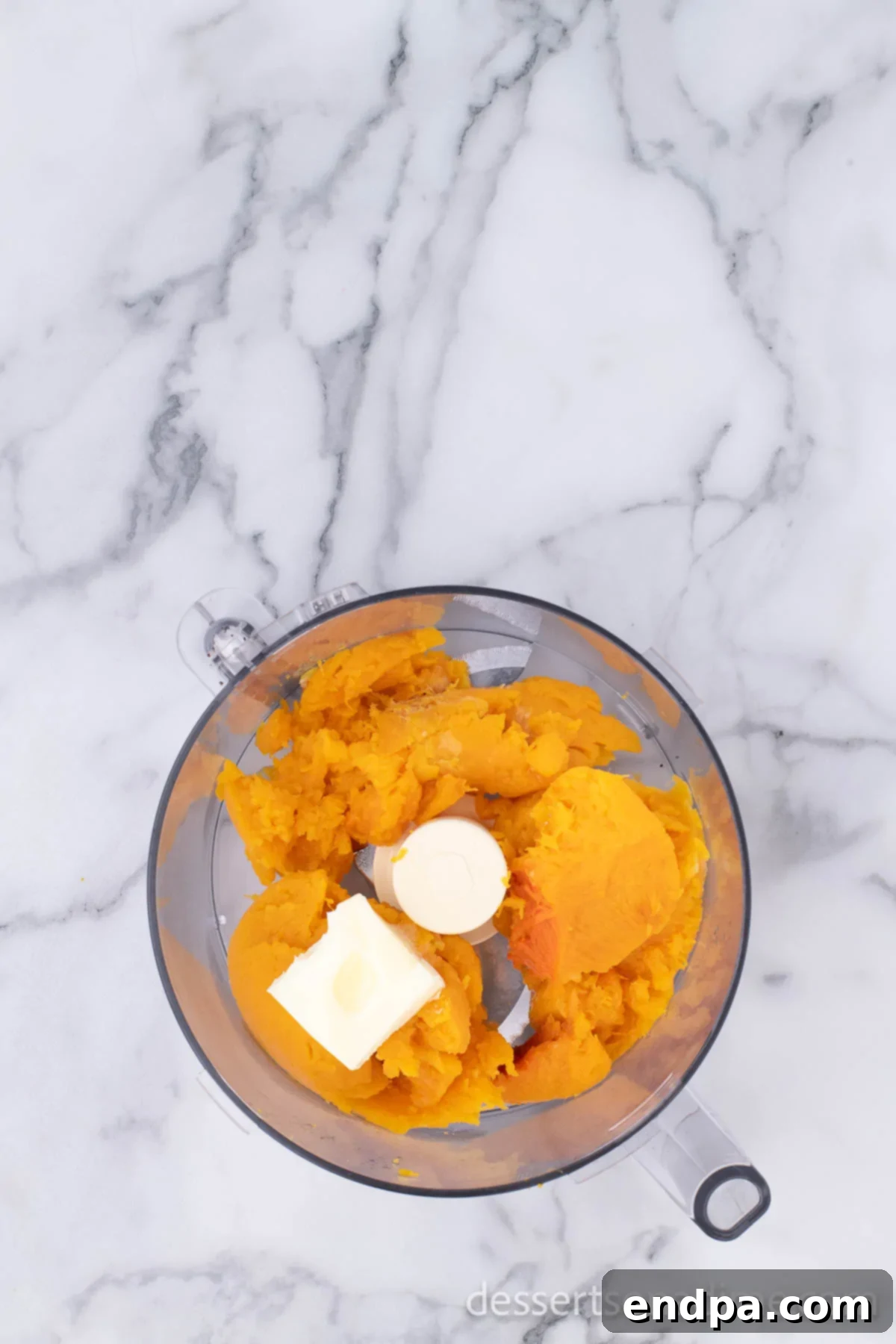 Golden Harvest Butternut Squash Pie 7 Butter added to food processor with squash.