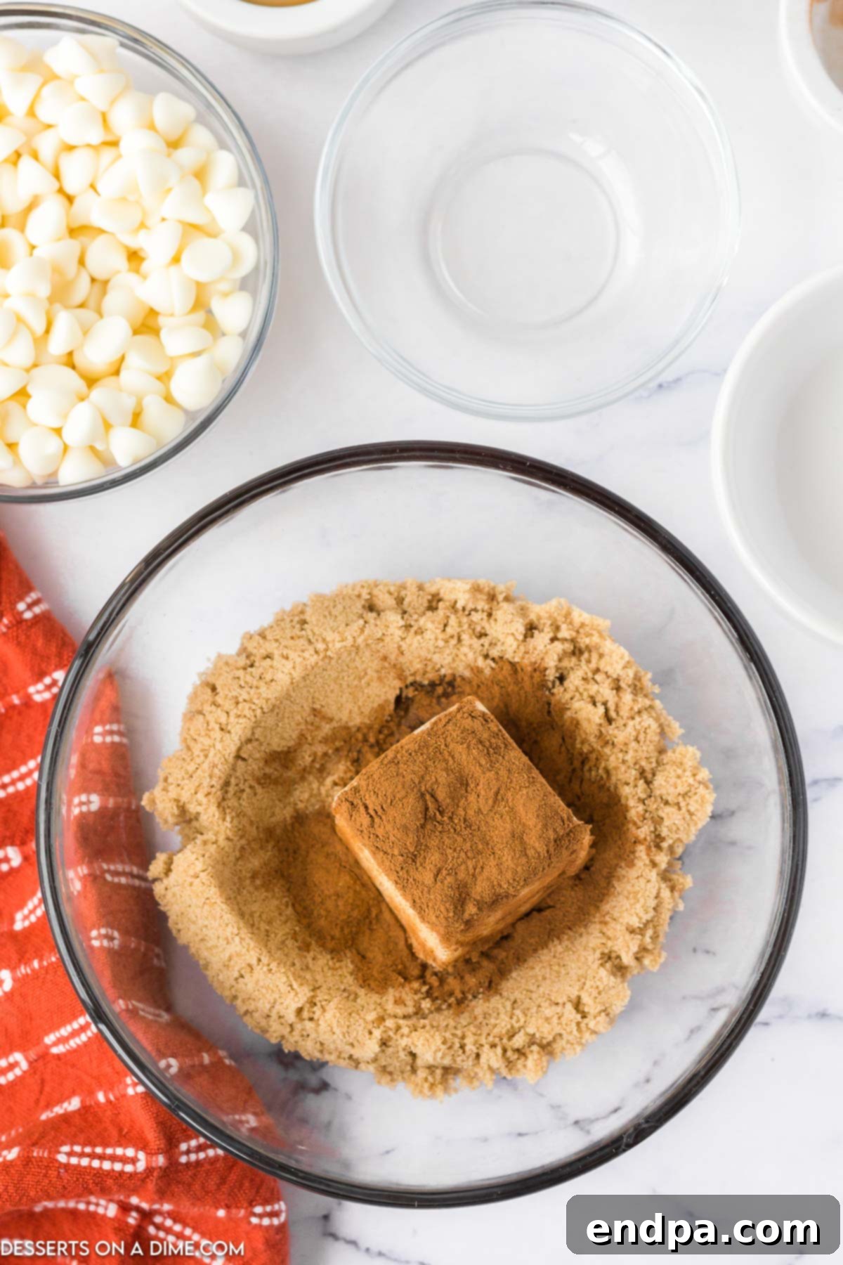 Frosted Cinnamon Popcorn 4 Large bowl with butter, brown sugar and cinnamon in a bowl.