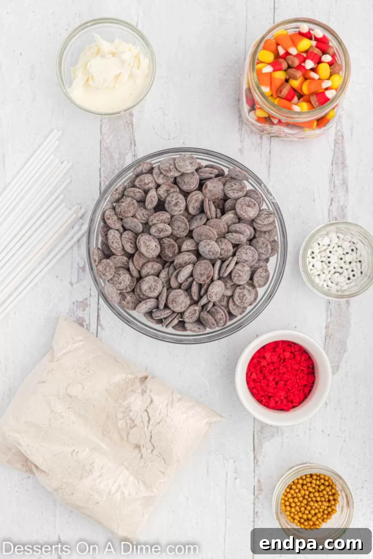 Ingredients for Thanksgiving cake pops: cake mix, cream cheese frosting, chocolate candy melts, candy corn, heart sprinkles, and cake pop sticks.