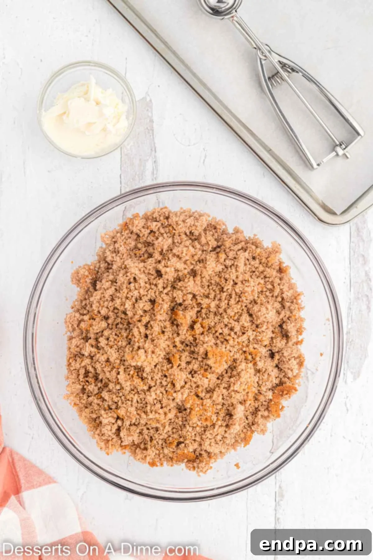 Bowl of cake crumbled into pieces.