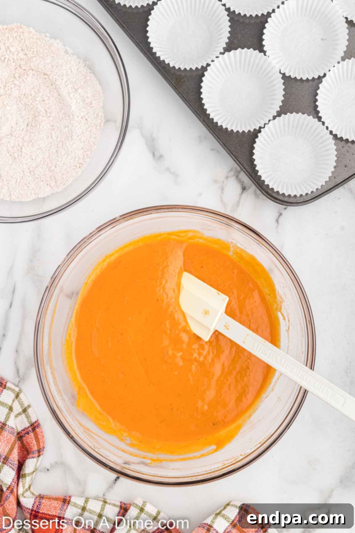 Combine wet ingredients in a bowl: pumpkin purée, granulated sugar, brown sugar, eggs, vanilla extract, and evaporated milk.