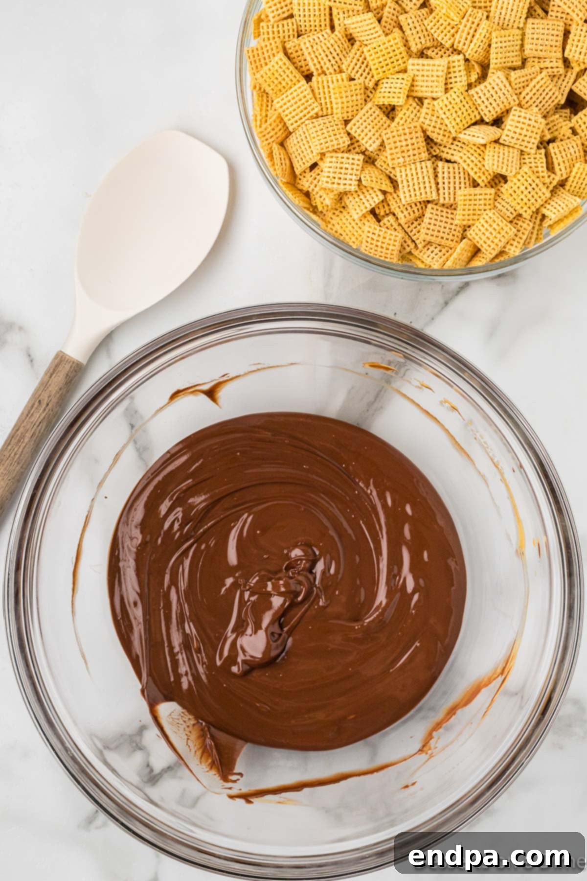 Double Fudge Brownie Crunch 5 Chocolate mixture melted in a bowl.