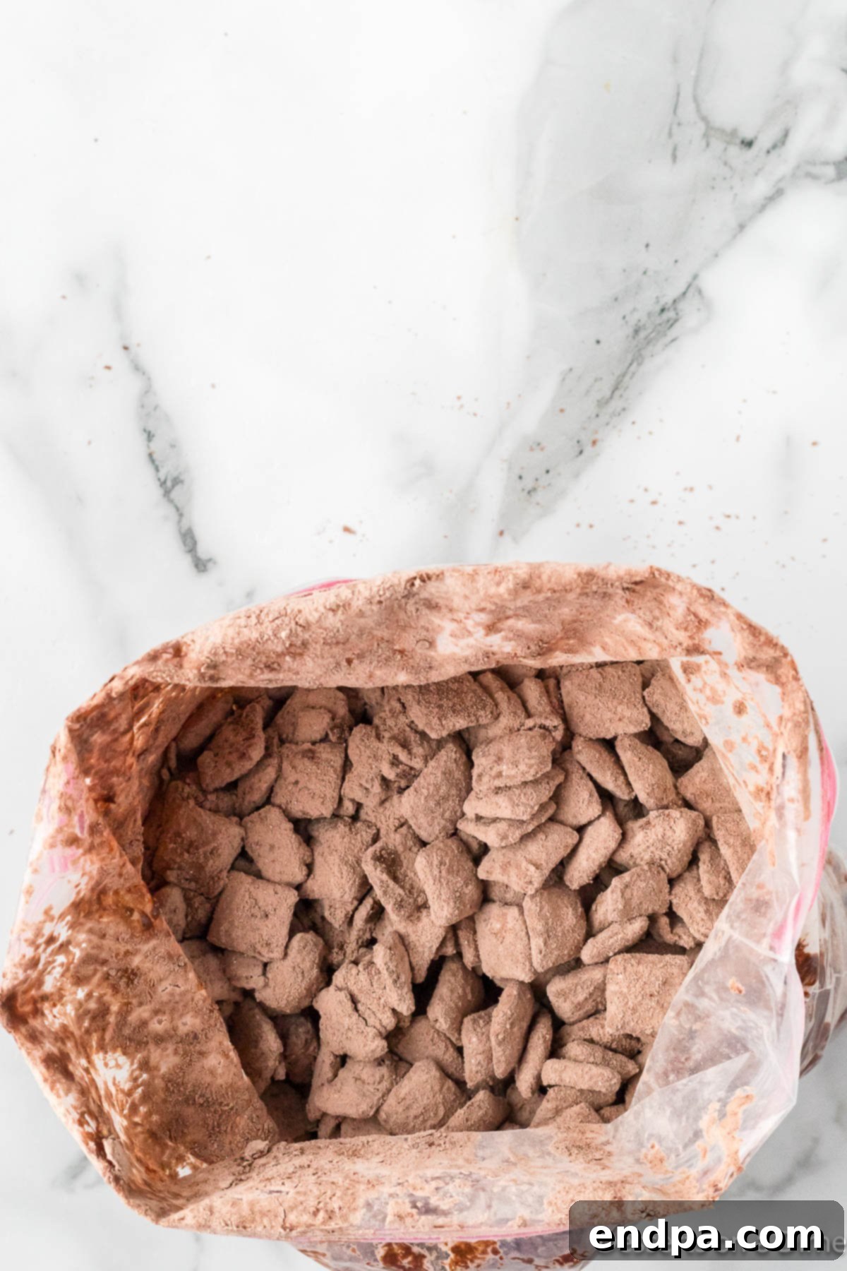 Double Fudge Brownie Crunch 9 Cereal mixture tossed in brownie mix.