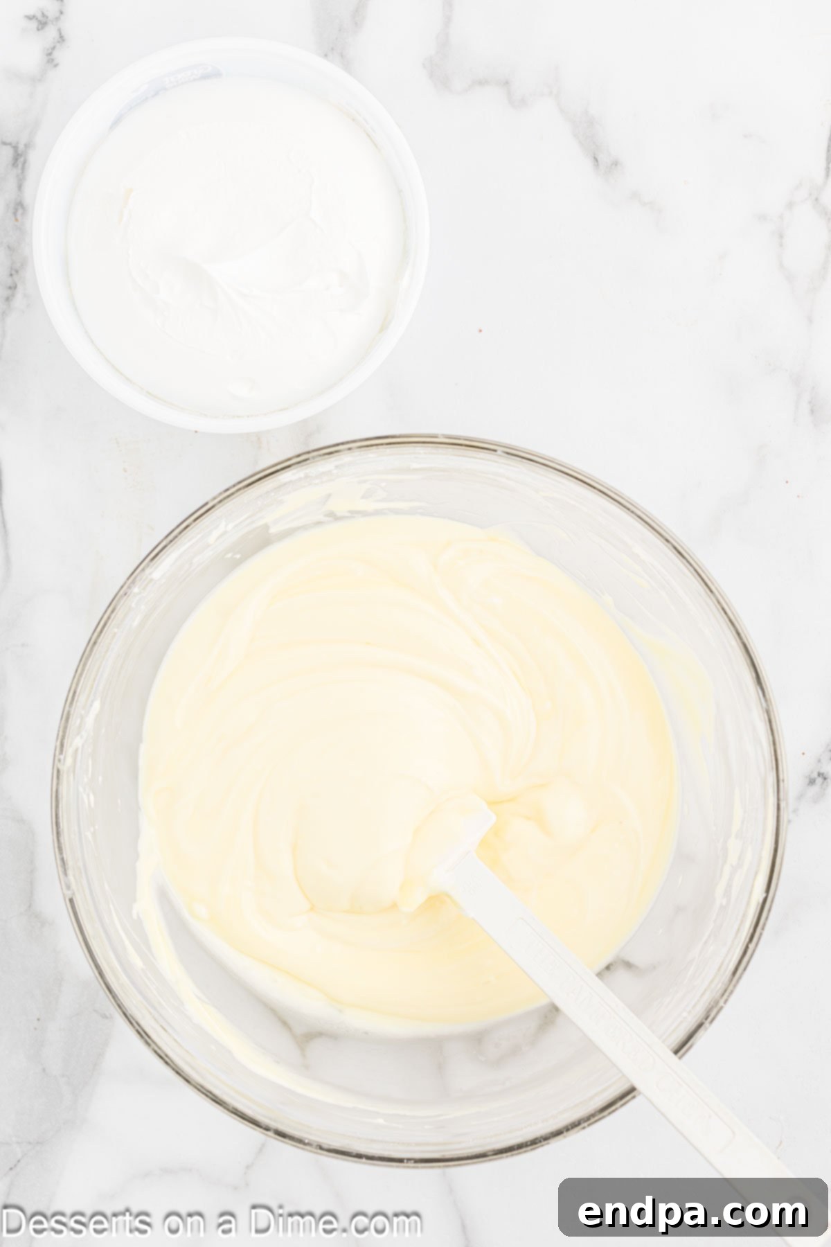 Pudding mixture combined into cream cheese mixture.