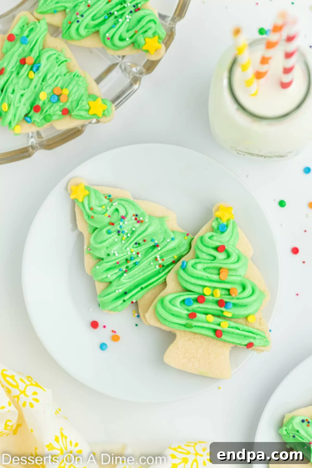Holiday Tree Sugar Cookie Delights 12 A festive plate filled with freshly baked and decorated Christmas Tree Sugar Cookies, ready for serving during the holidays.
