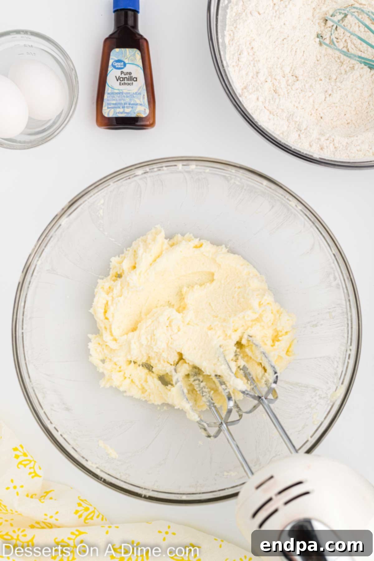 Holiday Tree Sugar Cookie Delights 5 A stand mixer bowl showing creamed butter and sugar, light and fluffy, before eggs are added.