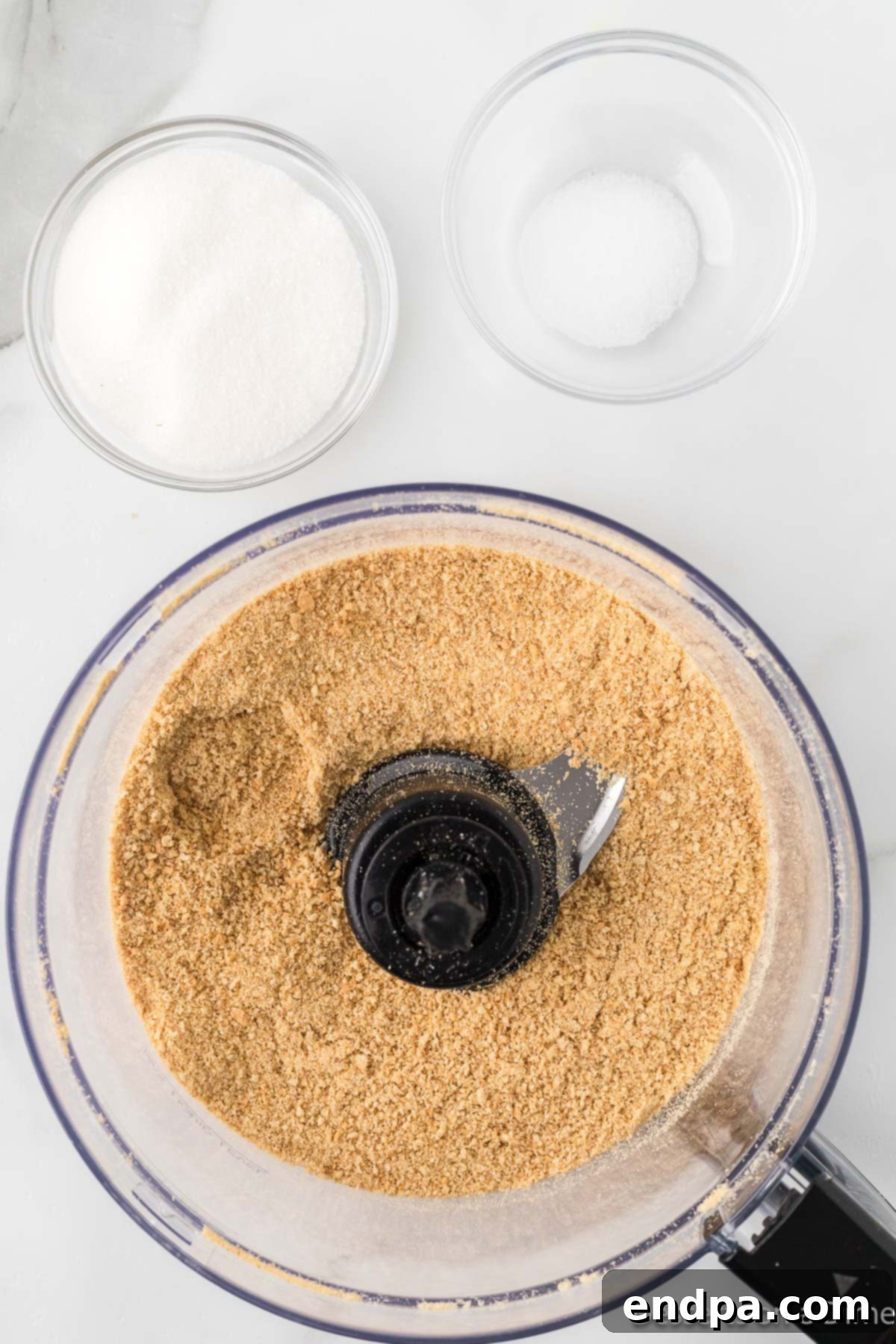 Cool Lemon Cloud Pie 4 Graham cracker crumbs being processed in a food processor.