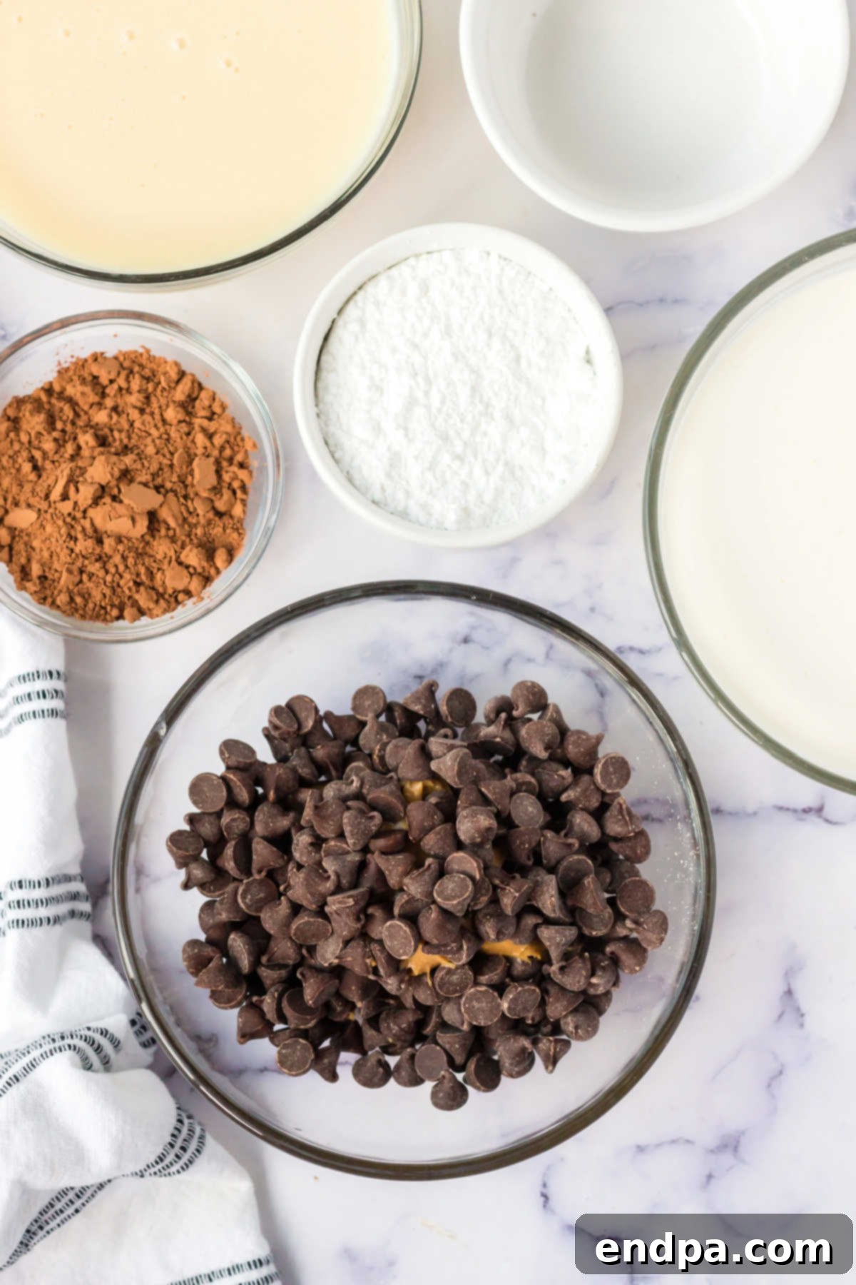 Muddy Munch Ice Cream 3 Bowl of melted chocolate chips and peanut butter, ready for Chex cereal.