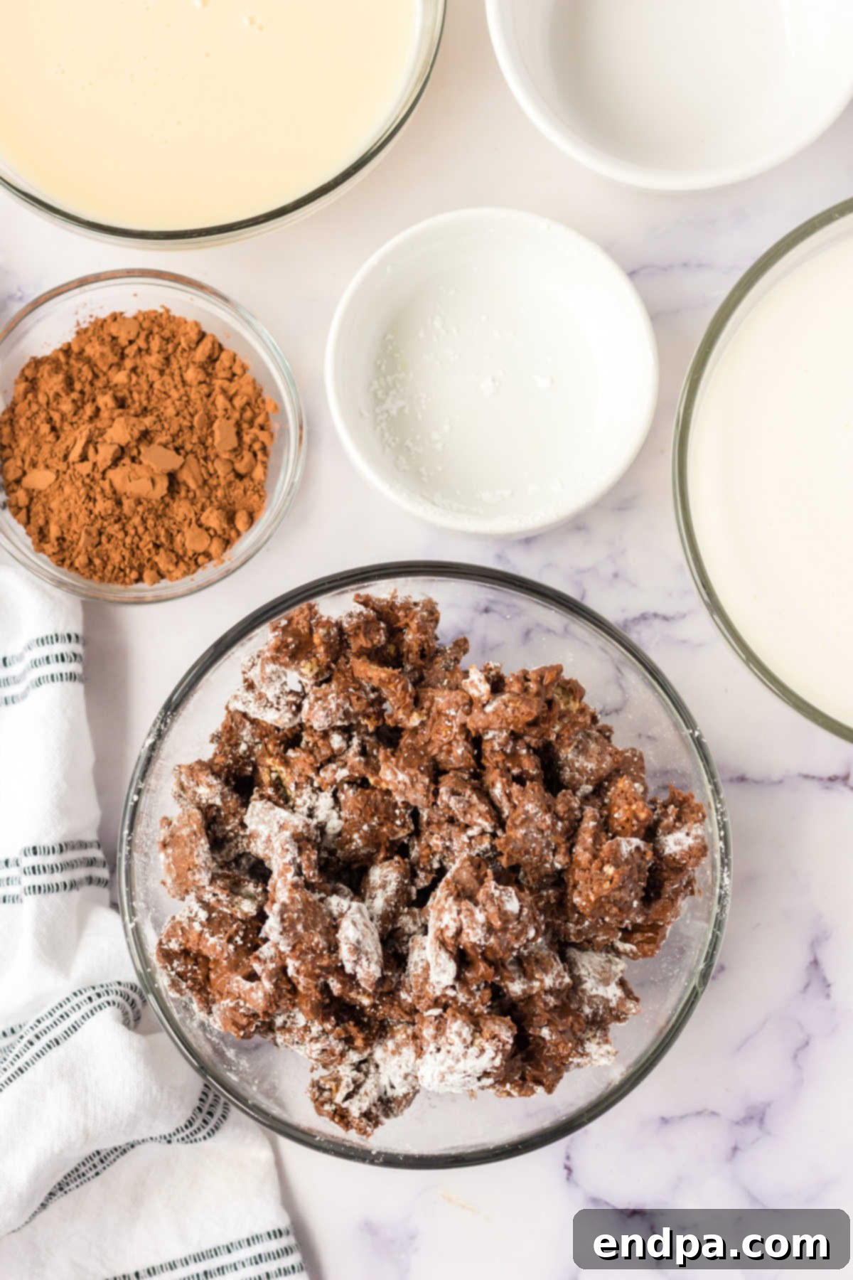 Muddy Munch Ice Cream 4 Chex cereal being added to the melted chocolate and peanut butter mixture in a bowl.