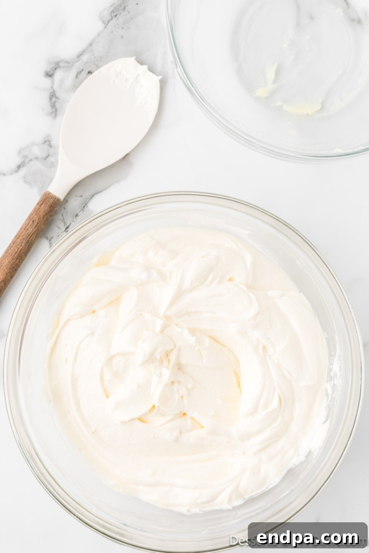 Crimson Velvet Dream 11 Cool whip folded into mixture. Light and airy cool whip being folded into the filling.