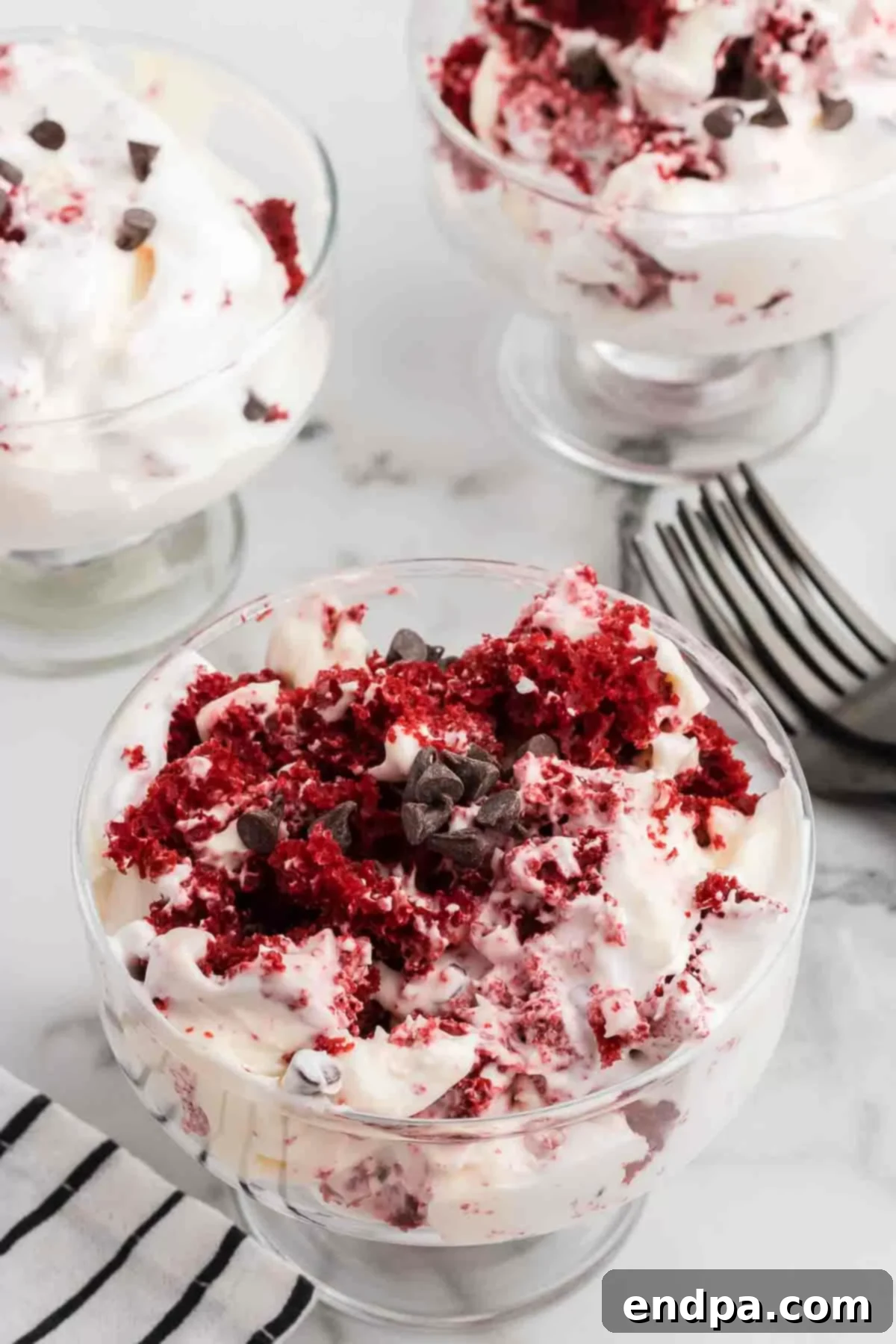 Crimson Velvet Dream 18 Red velvet trifle in serving dish. A delicious red velvet trifle, ready for serving.