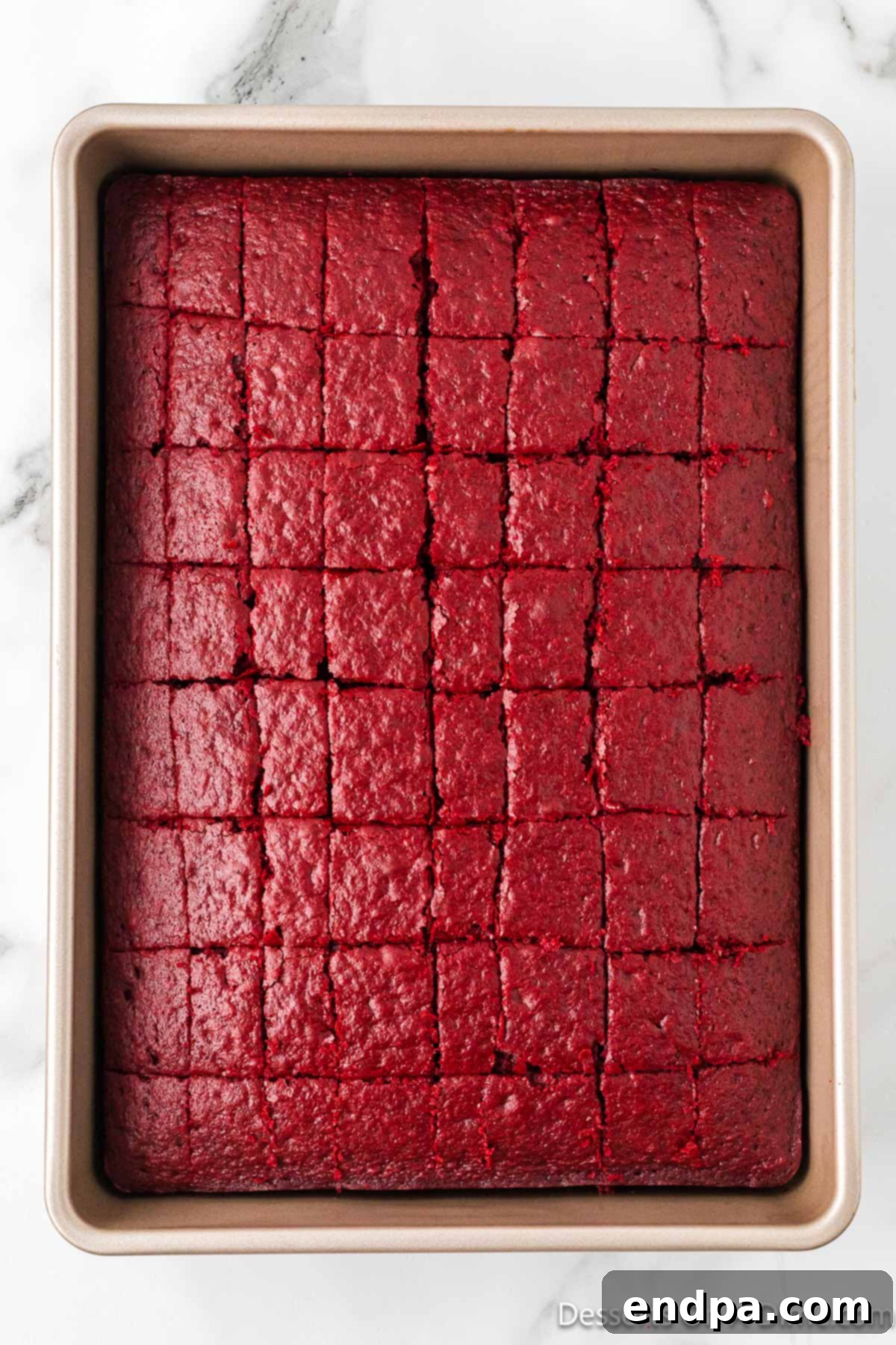 Crimson Velvet Dream 6 Cake cut into cubes. Uniform red velvet cake cubes, ready for layering.