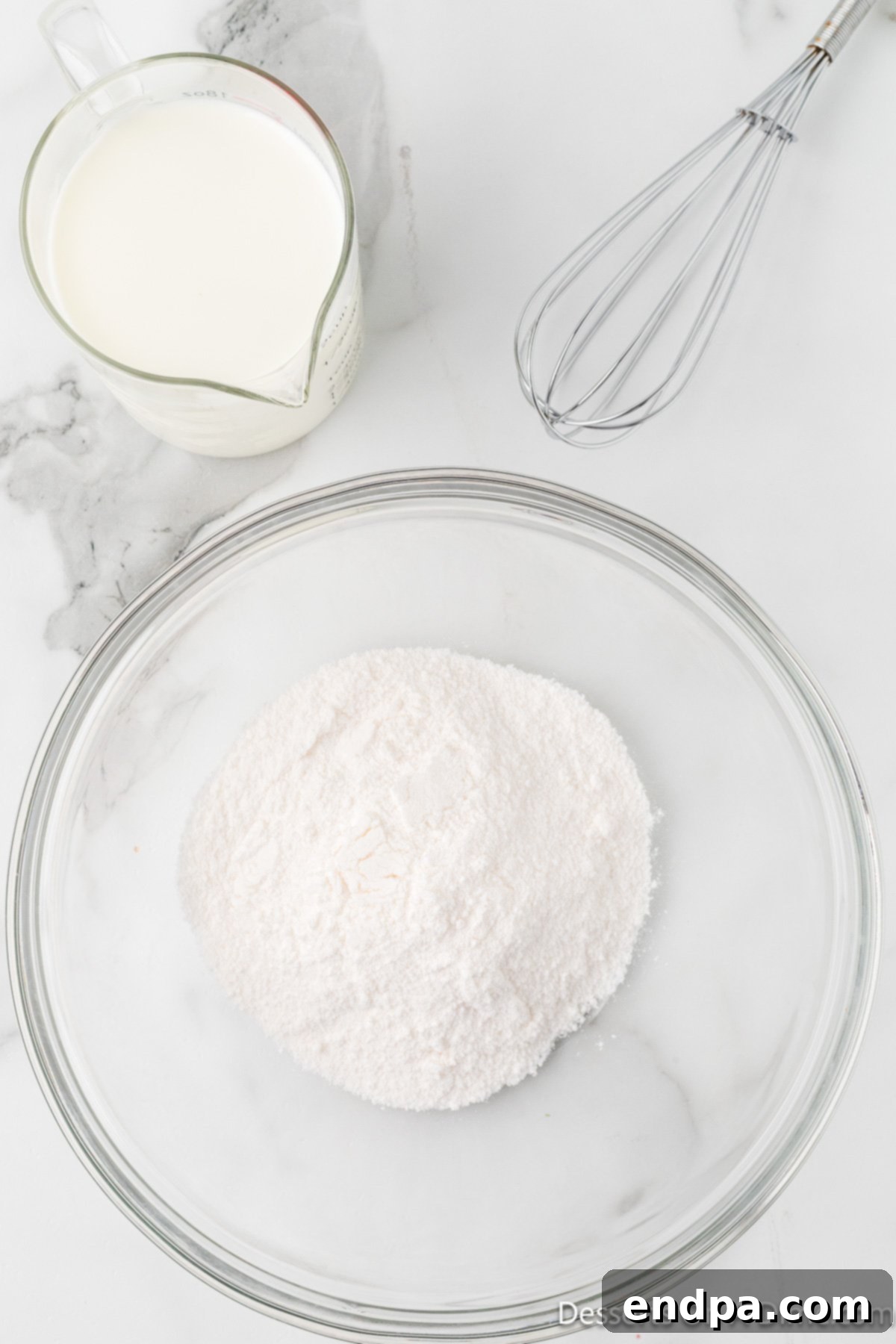 Crimson Velvet Dream 7 Pudding mix combined in bowl. A smooth, white pudding mixture, setting nicely.