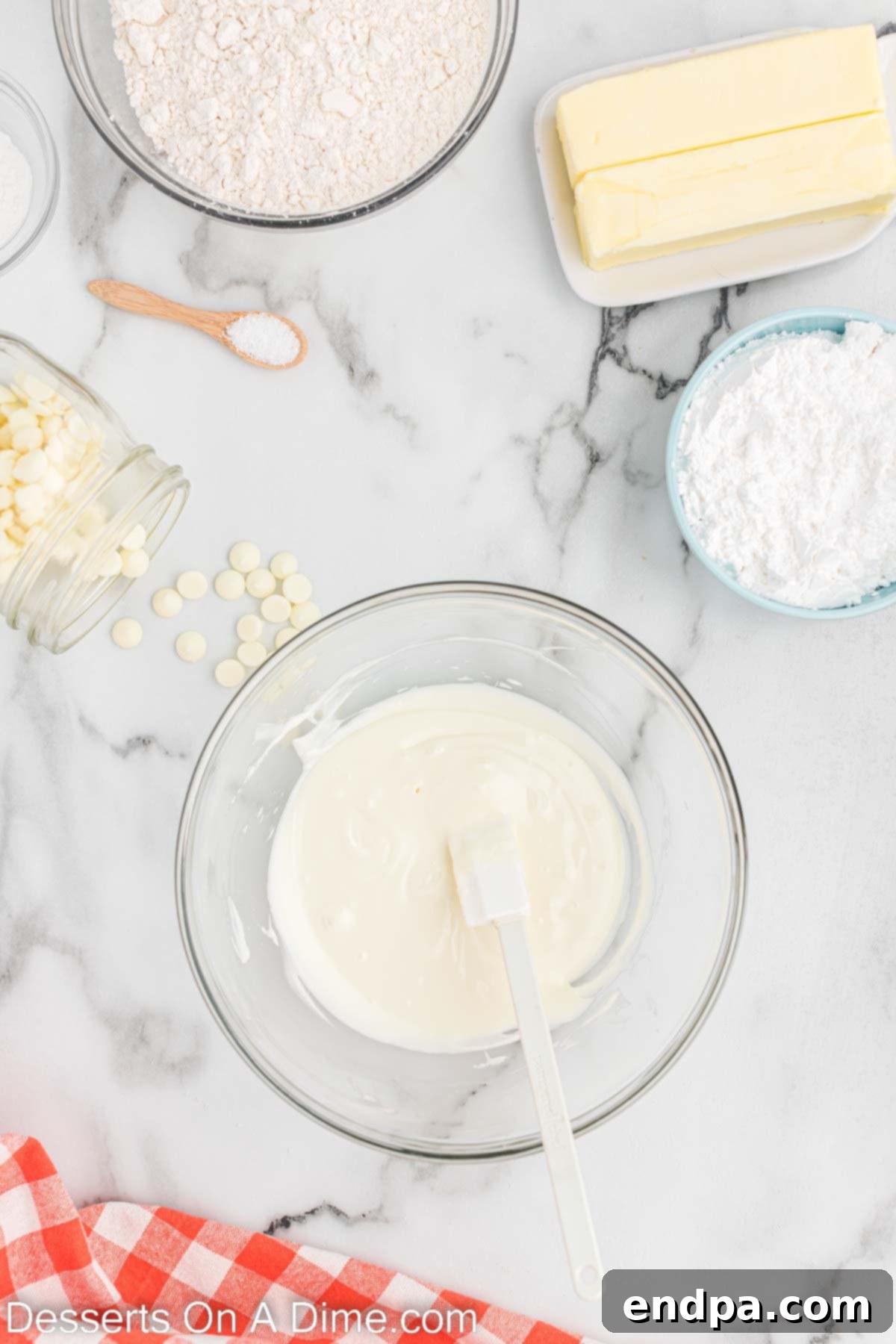 Melted white chocolate in a bowl, ready for mixing.