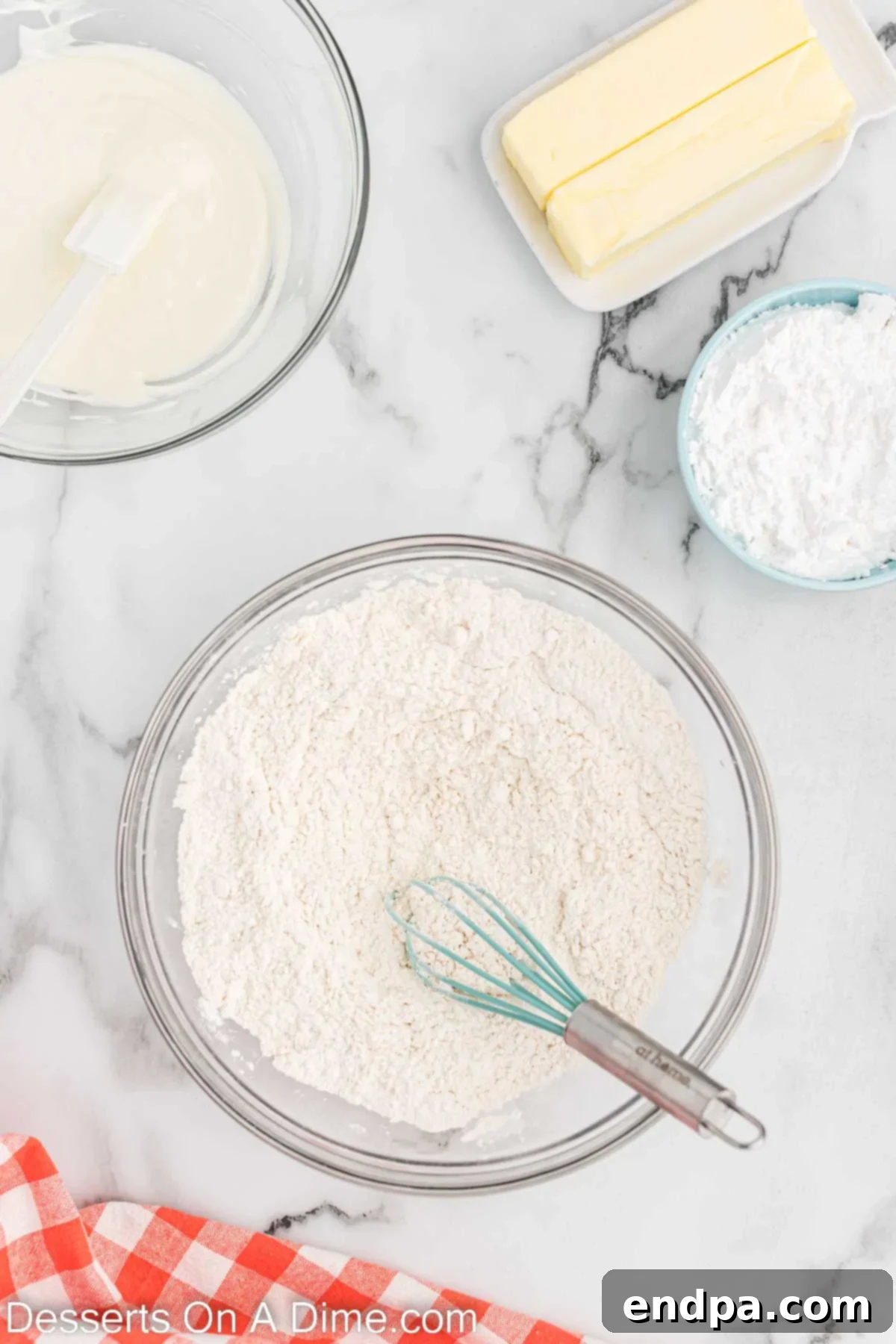 Dry ingredients for cookies (flour, baking powder, salt) combined in a mixing bowl.