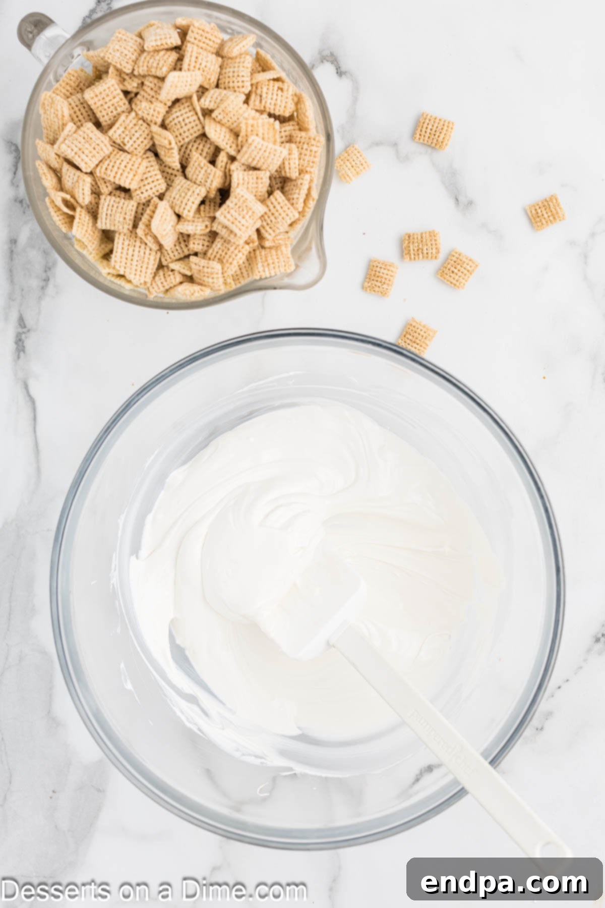 Birthday Cake Snack Mix 4 Melted candy coating in a mixing bowl.
